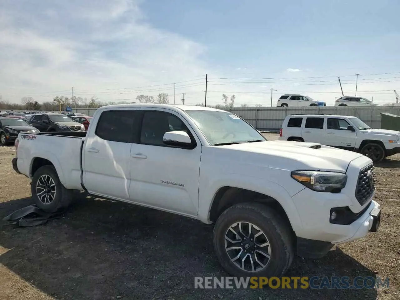 4 Photograph of a damaged car 3TMDZ5BN7PM154628 TOYOTA TACOMA 2023