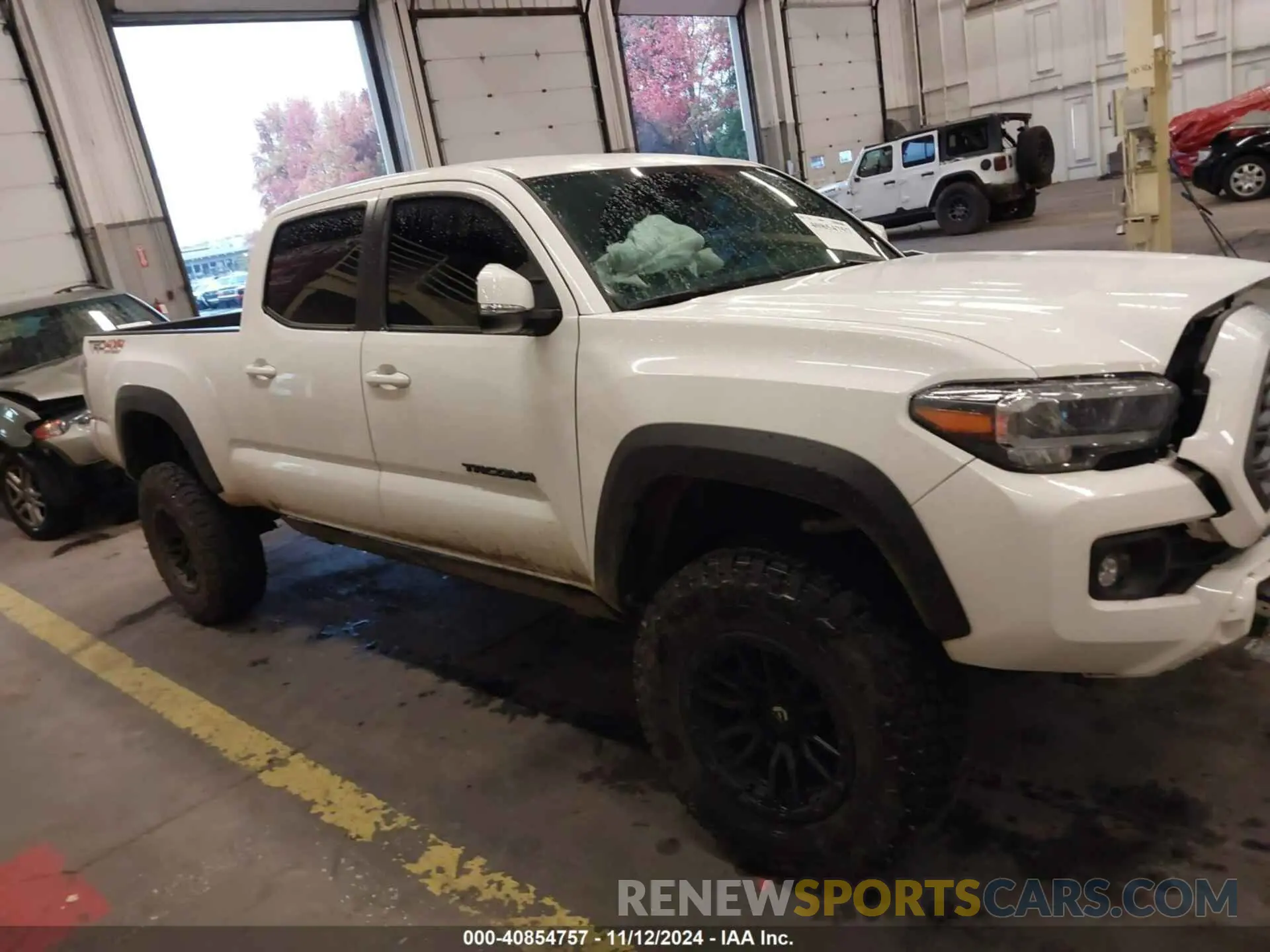 13 Photograph of a damaged car 3TMDZ5BN7PM157240 TOYOTA TACOMA 2023