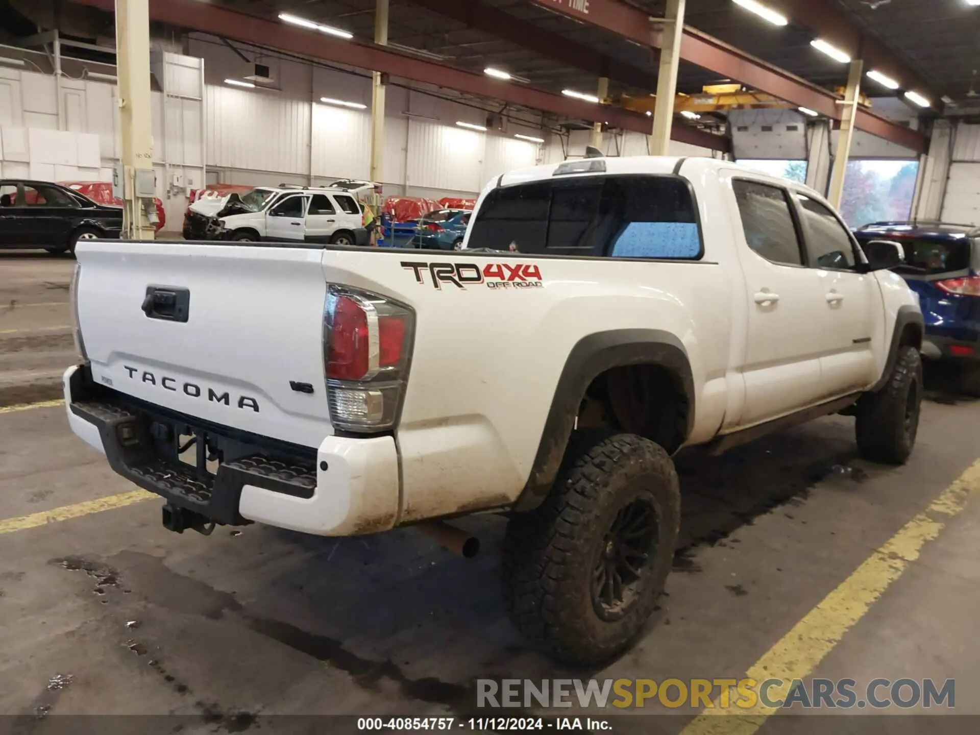 4 Photograph of a damaged car 3TMDZ5BN7PM157240 TOYOTA TACOMA 2023