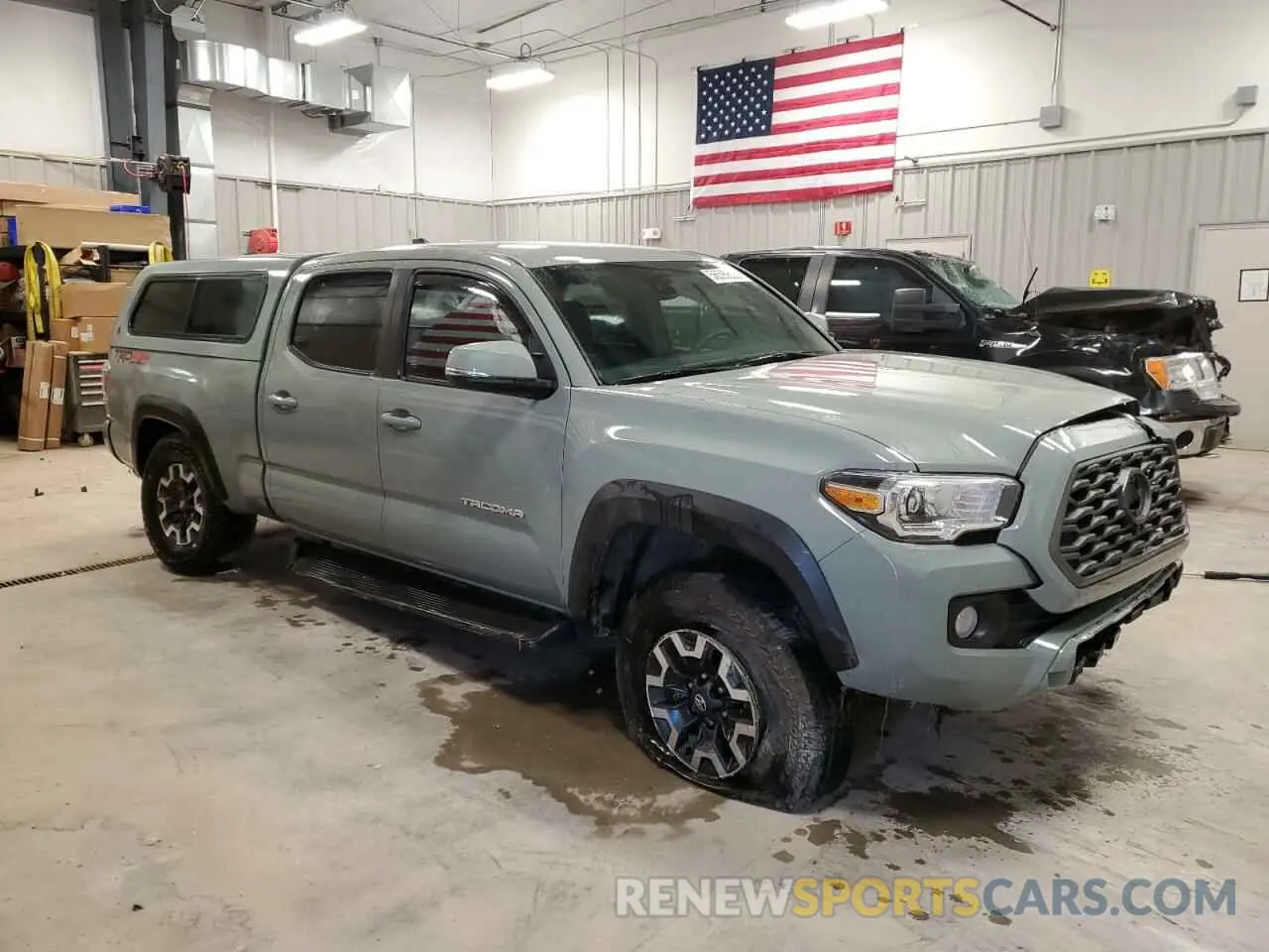 4 Photograph of a damaged car 3TMDZ5BN8PM162785 TOYOTA TACOMA 2023