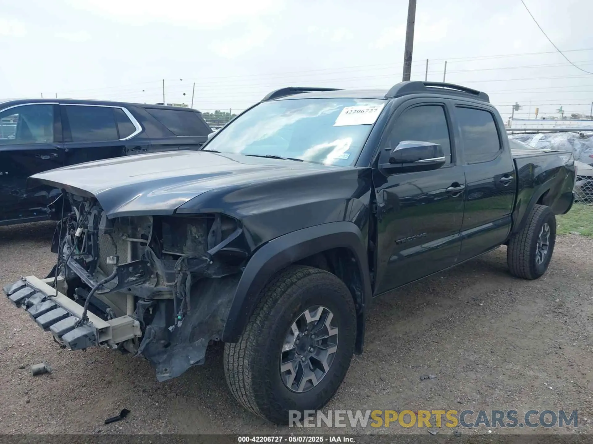 2 Photograph of a damaged car 3TMDZ5BN9PM147969 TOYOTA TACOMA 2023