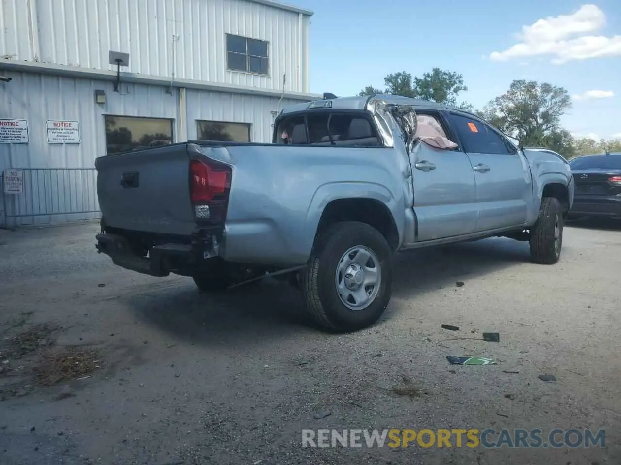 3 Photograph of a damaged car 3TYAX5GN0PT081723 TOYOTA TACOMA 2023