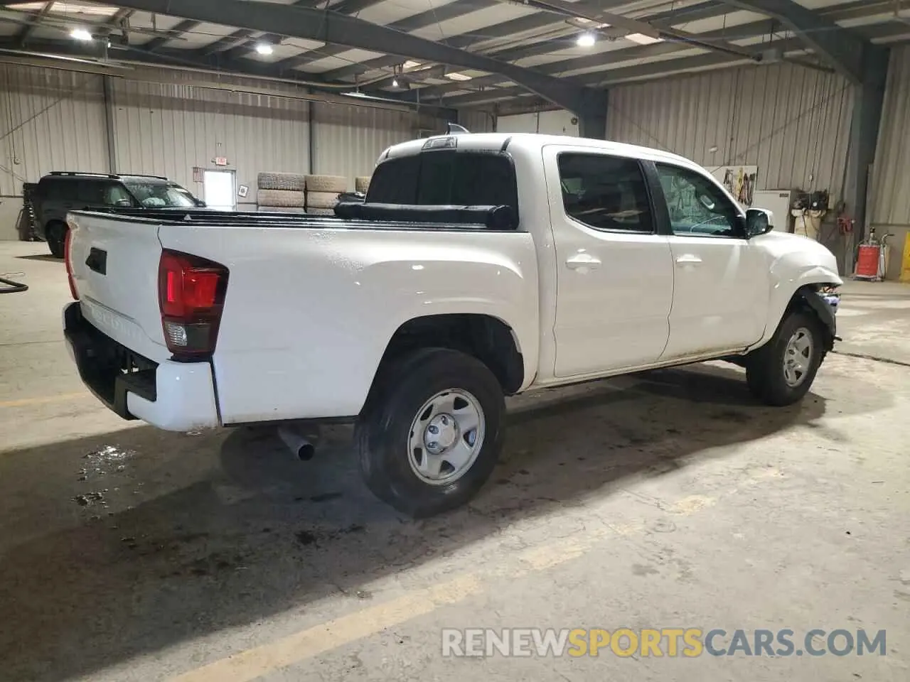 3 Photograph of a damaged car 3TYAX5GNXPT071989 TOYOTA TACOMA 2023
