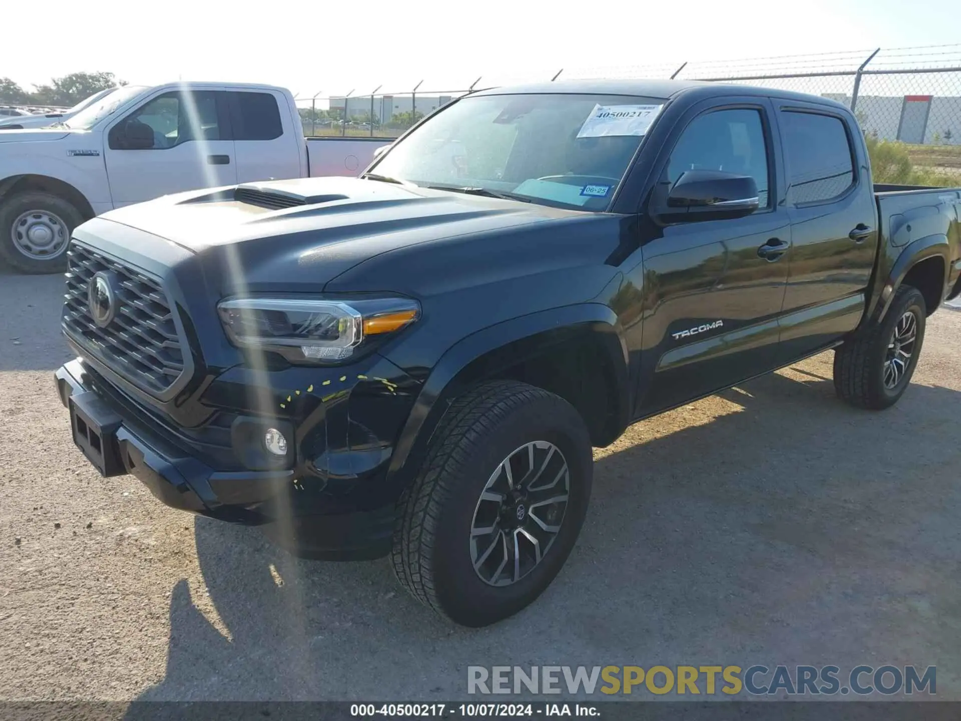 2 Photograph of a damaged car 3TYAZ5CN0PT032909 TOYOTA TACOMA 2023