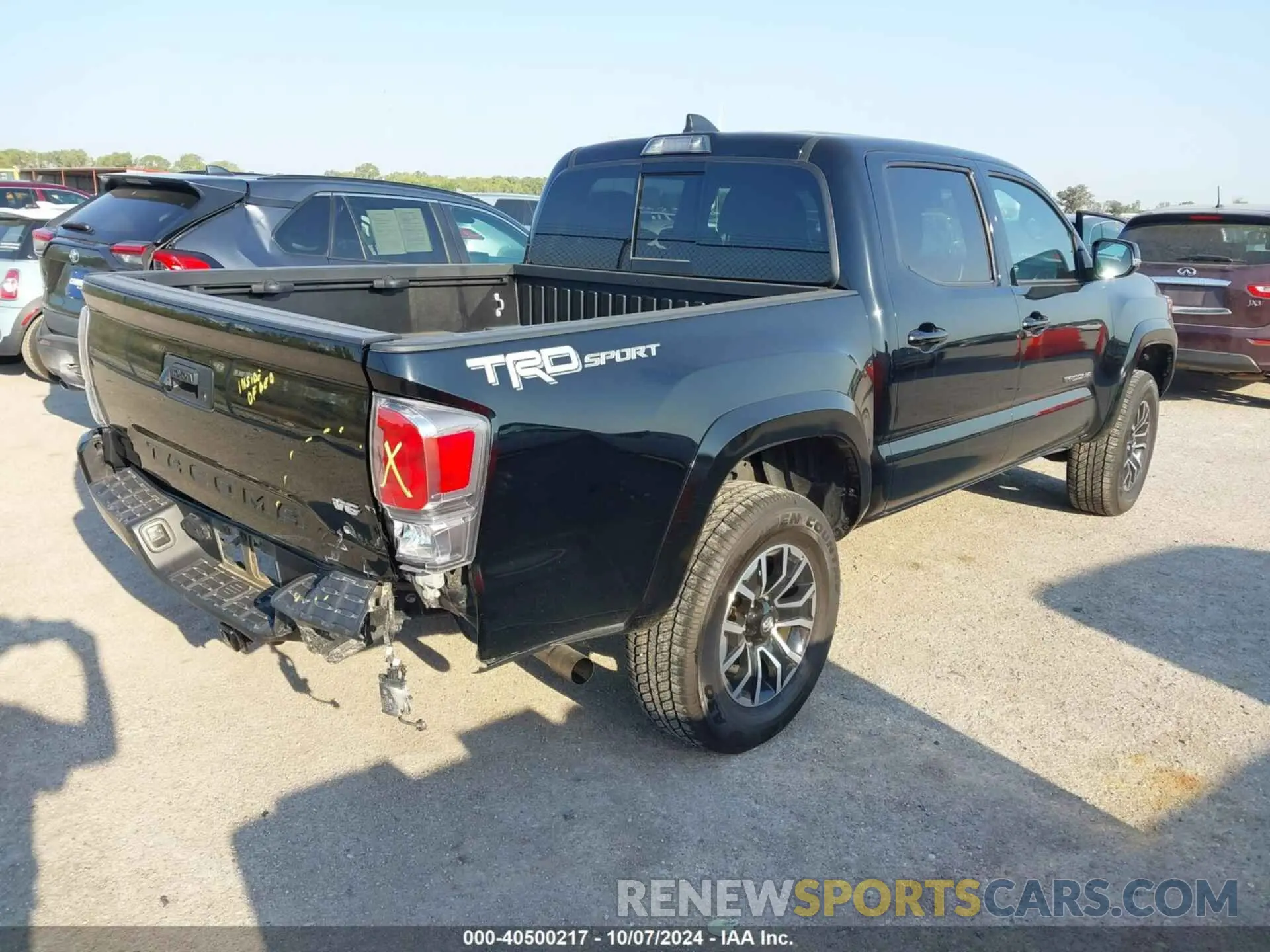 4 Photograph of a damaged car 3TYAZ5CN0PT032909 TOYOTA TACOMA 2023