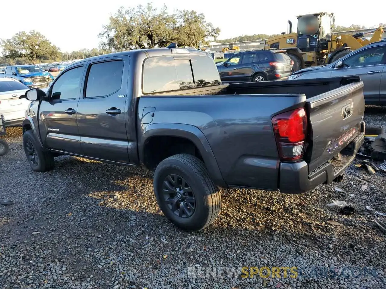2 Photograph of a damaged car 3TYAZ5CN9PT039874 TOYOTA TACOMA 2023