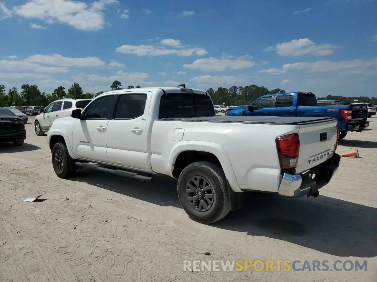 2 Photograph of a damaged car 3TYBZ5DNXPT002674 TOYOTA TACOMA 2023