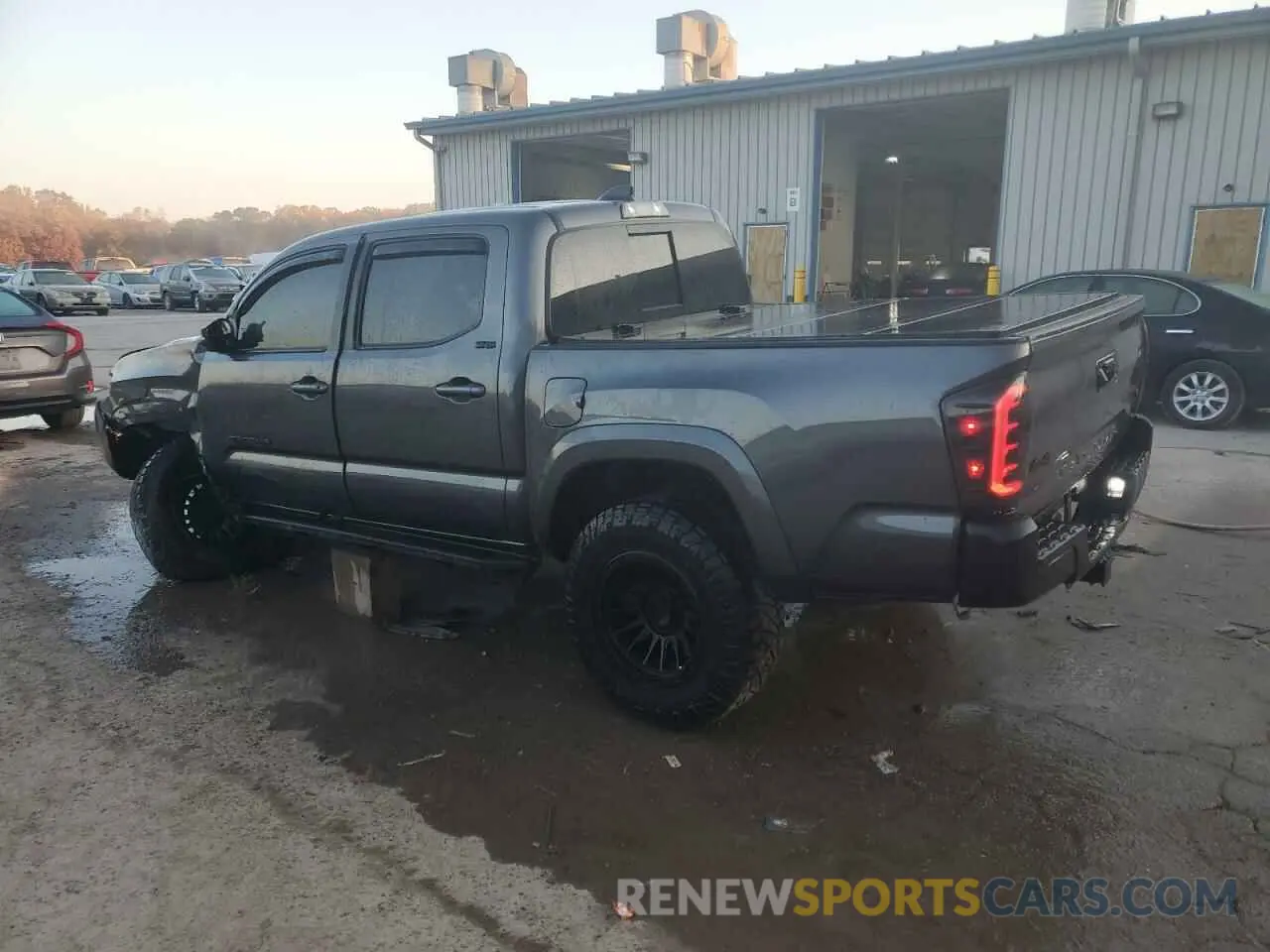 2 Photograph of a damaged car 3TYCZ5AN3PT137603 TOYOTA TACOMA 2023