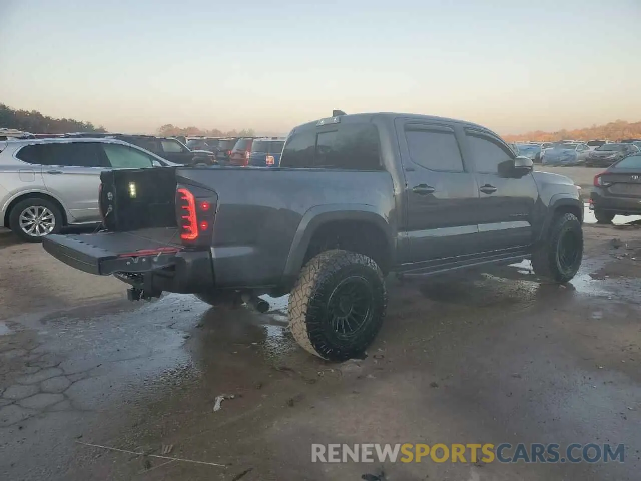 3 Photograph of a damaged car 3TYCZ5AN3PT137603 TOYOTA TACOMA 2023