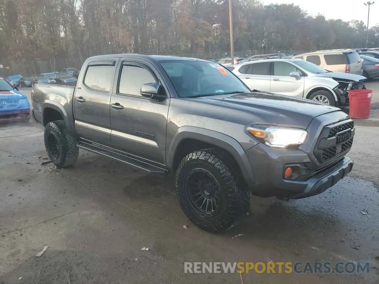4 Photograph of a damaged car 3TYCZ5AN3PT137603 TOYOTA TACOMA 2023