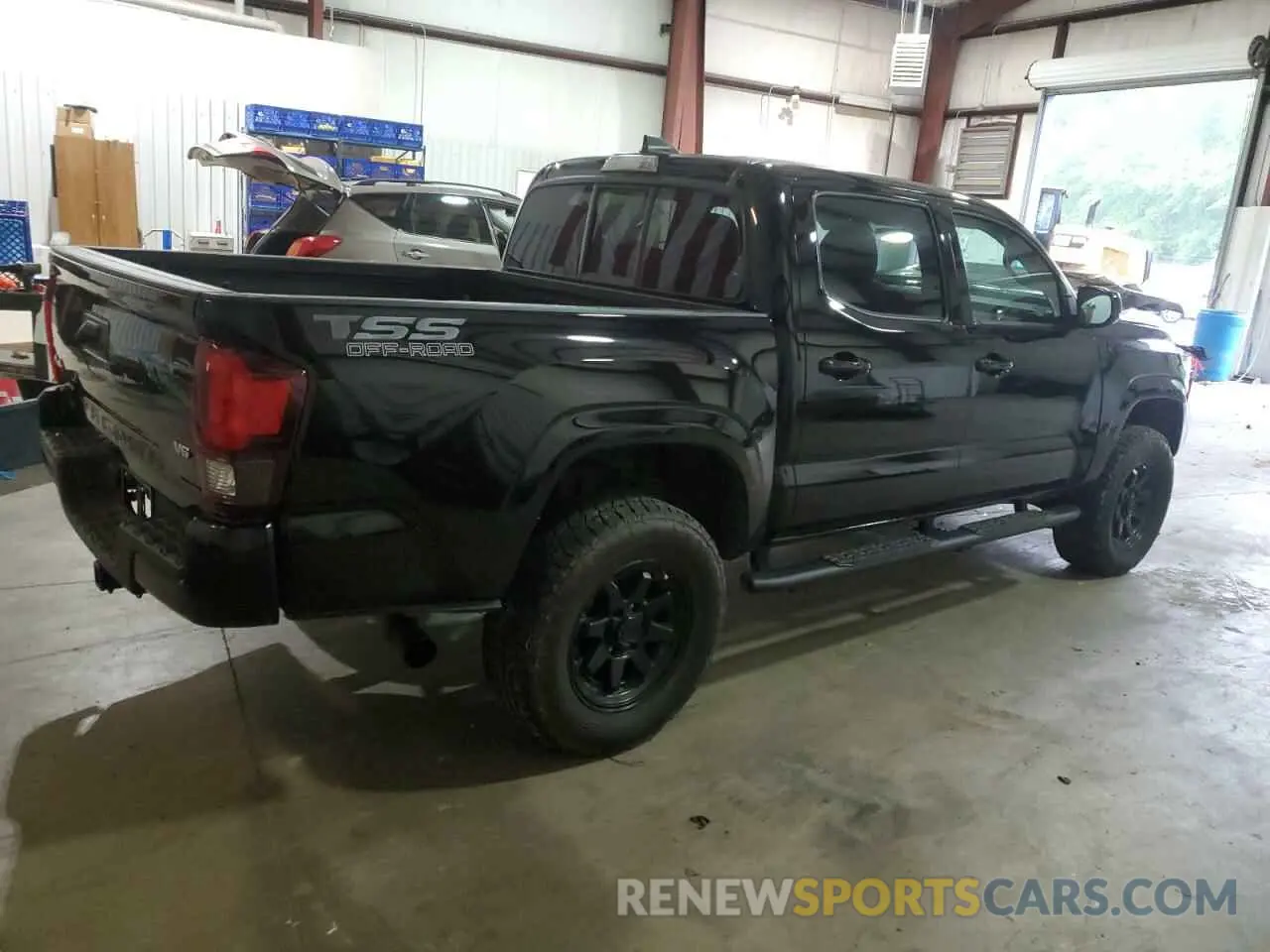 3 Photograph of a damaged car 3TYCZ5AN4PT138808 TOYOTA TACOMA 2023