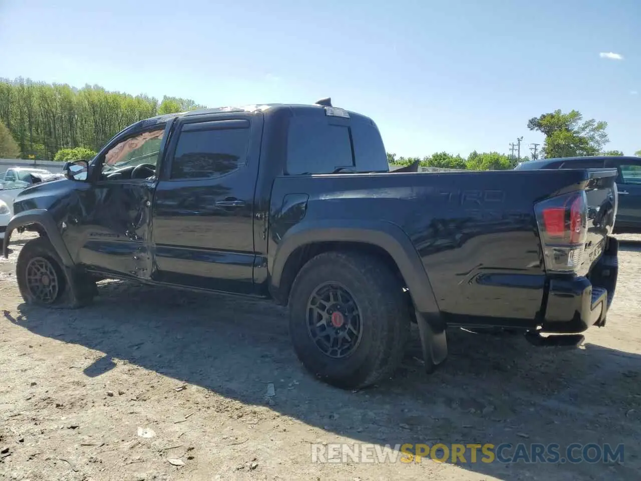 2 Photograph of a damaged car 3TYCZ5AN8PT157703 TOYOTA TACOMA 2023