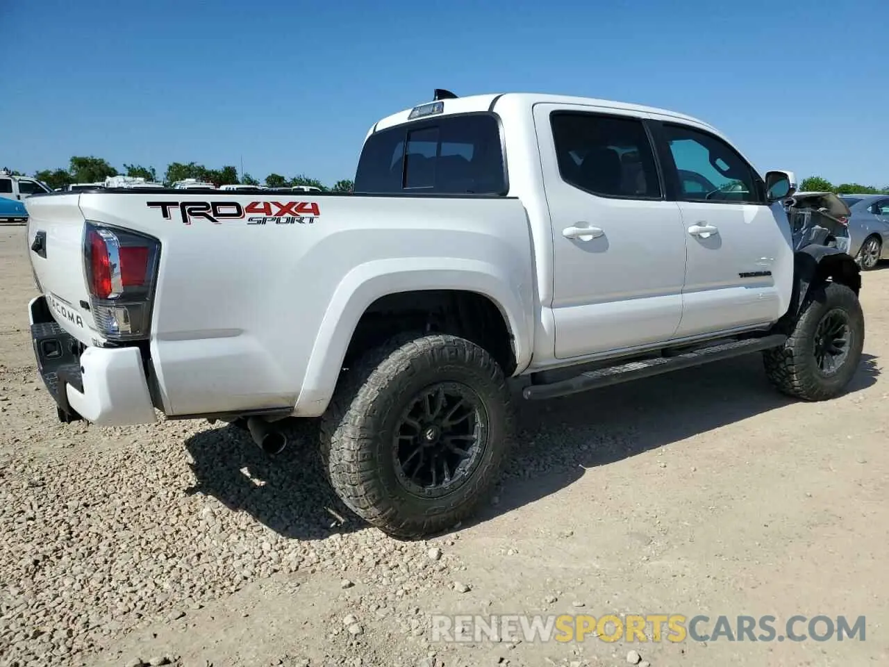 3 Photograph of a damaged car 3TYCZ5AN9PT129277 TOYOTA TACOMA 2023