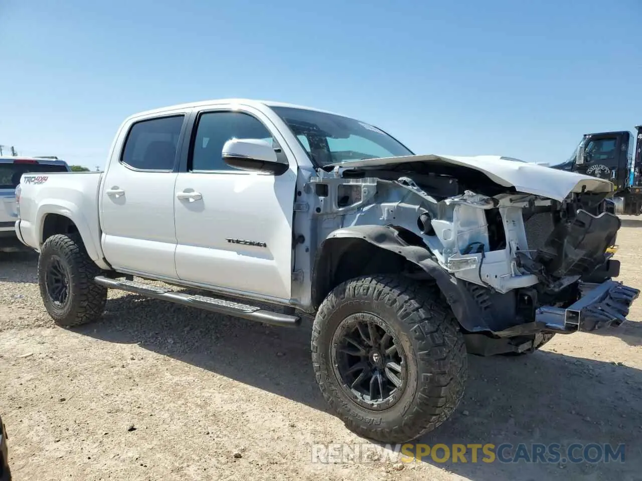 4 Photograph of a damaged car 3TYCZ5AN9PT129277 TOYOTA TACOMA 2023