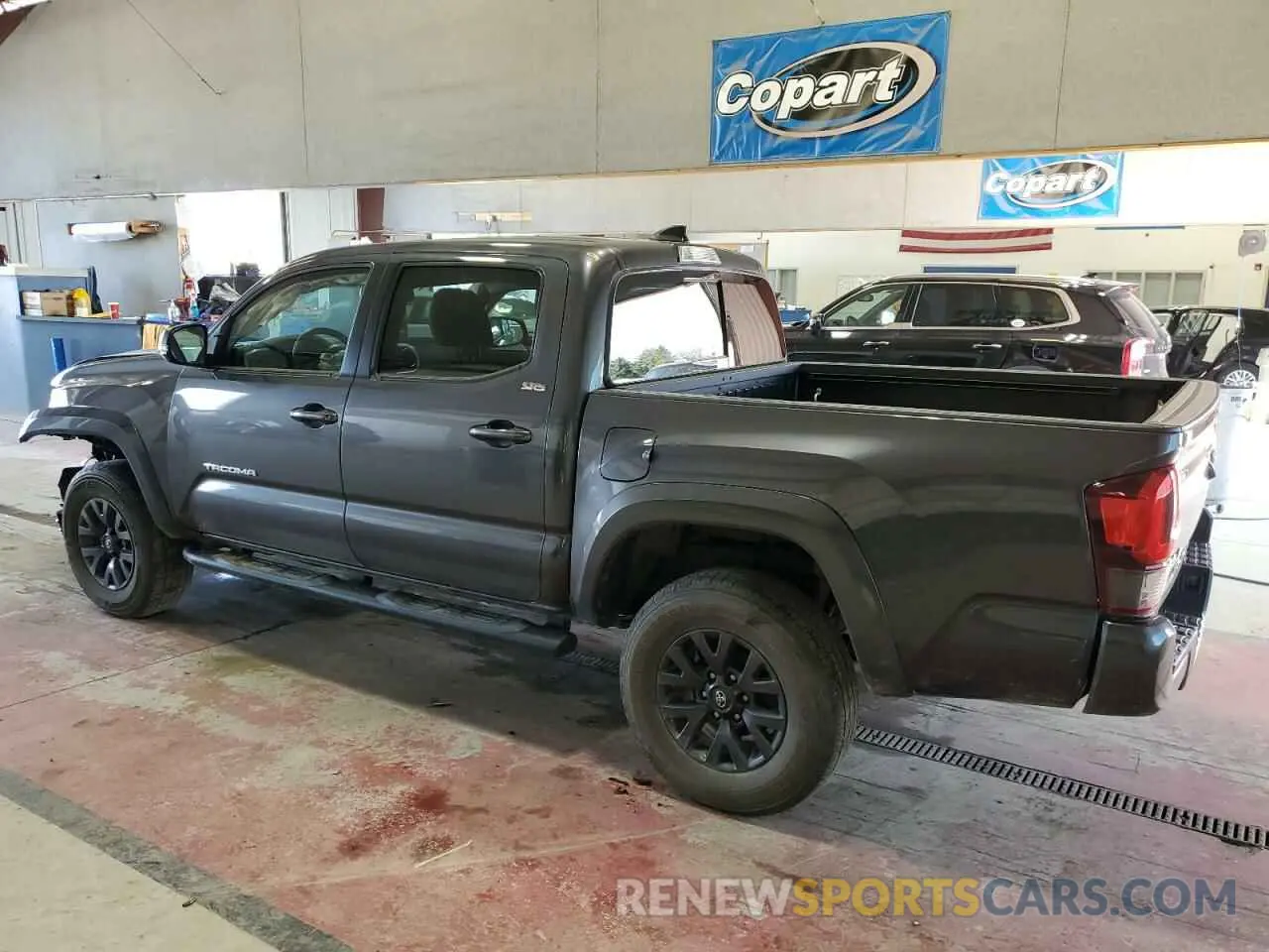 2 Photograph of a damaged car 3TYCZ5AN9PT173473 TOYOTA TACOMA 2023