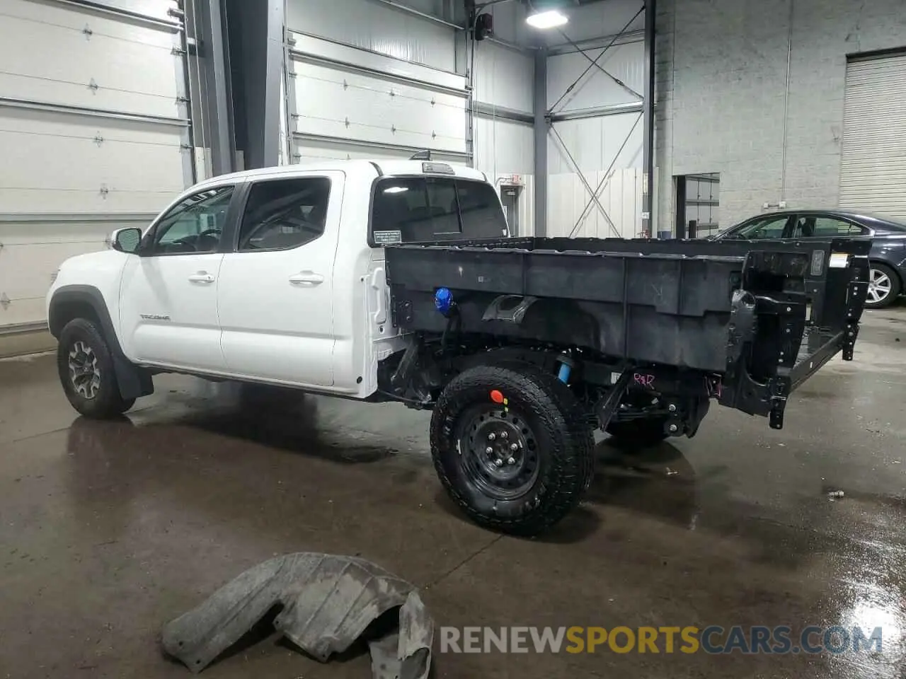 2 Photograph of a damaged car 3TYDZ5BN6PT031360 TOYOTA TACOMA 2023