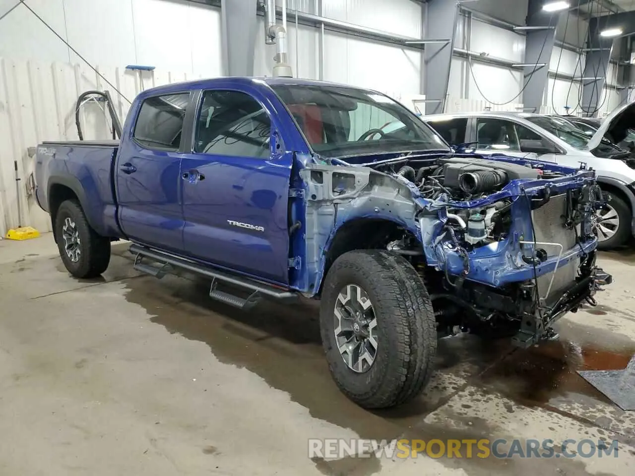 4 Photograph of a damaged car 3TYDZ5BN9PT035404 TOYOTA TACOMA 2023