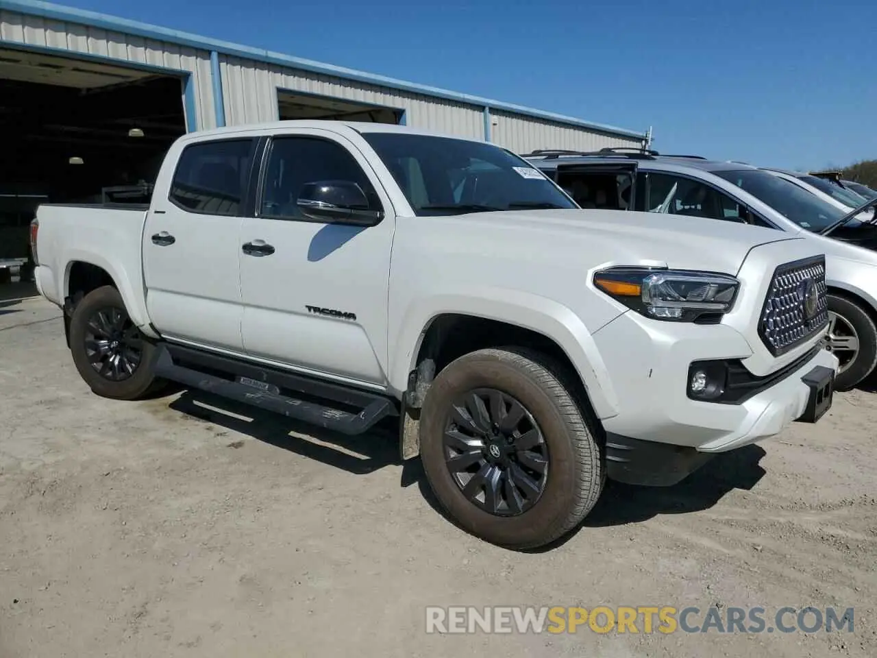 4 Photograph of a damaged car 3TYGZ5AN8PT115596 TOYOTA TACOMA 2023