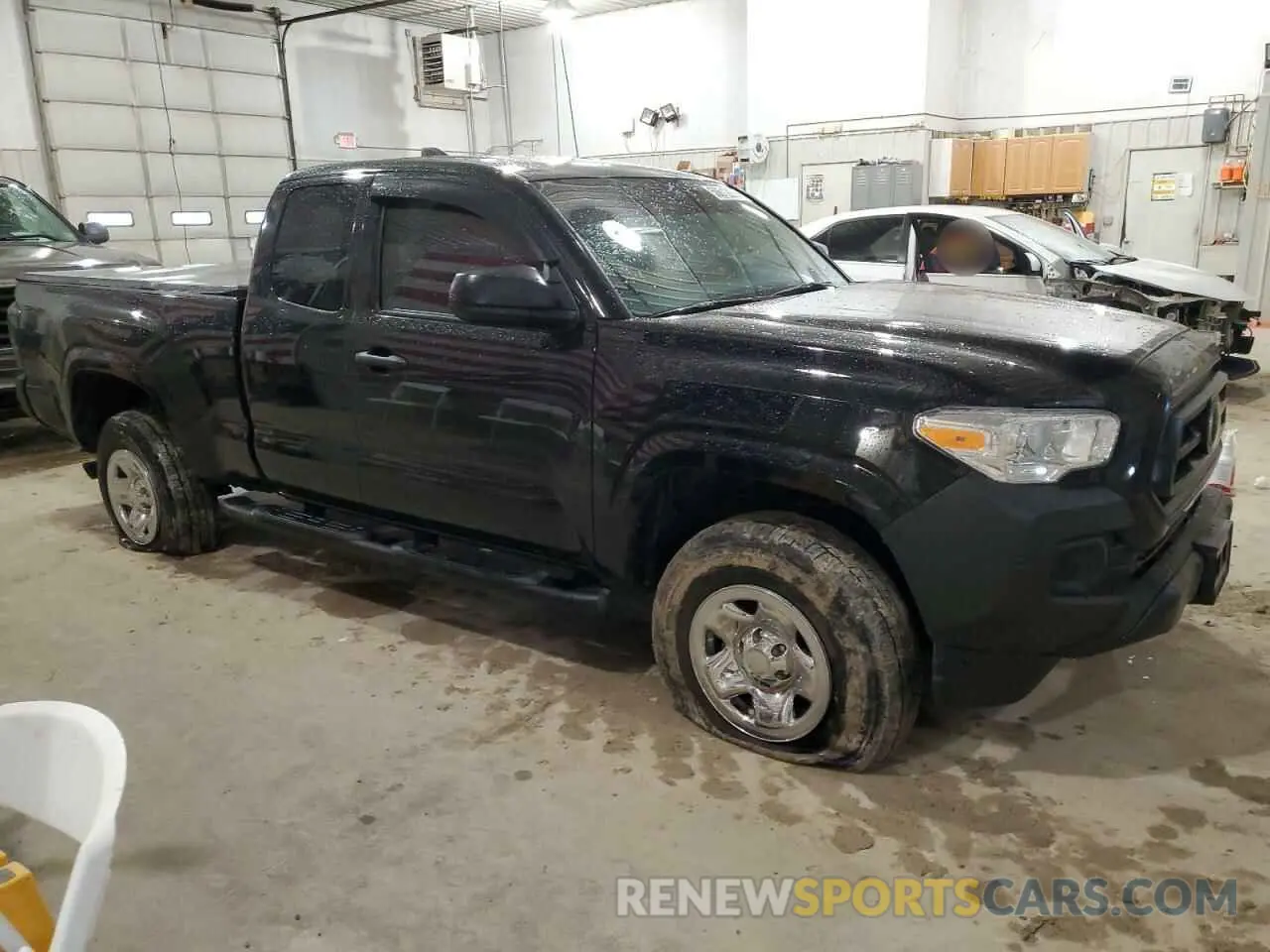 4 Photograph of a damaged car 3TYRX5GNXPT069453 TOYOTA TACOMA 2023
