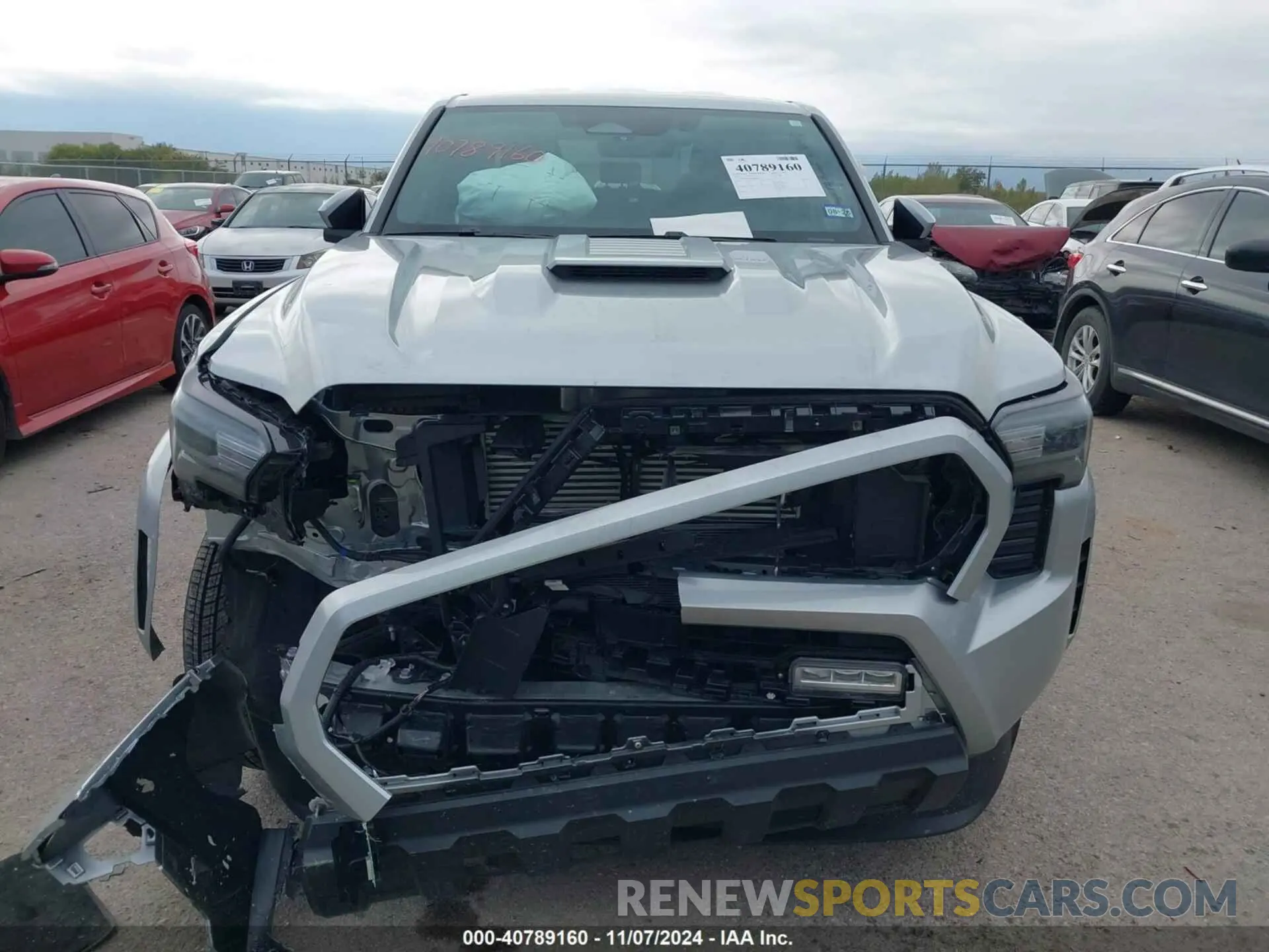 12 Photograph of a damaged car 3TMKB5FNXRM006479 TOYOTA TACOMA 2024