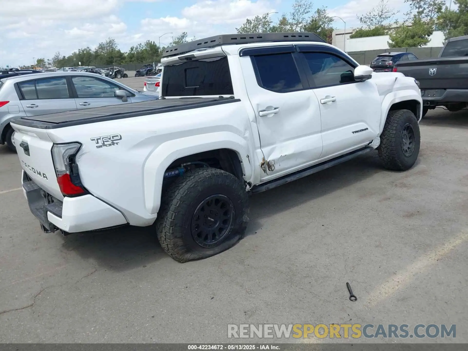 4 Photograph of a damaged car 3TMLB5JN1RM054917 TOYOTA TACOMA 2024