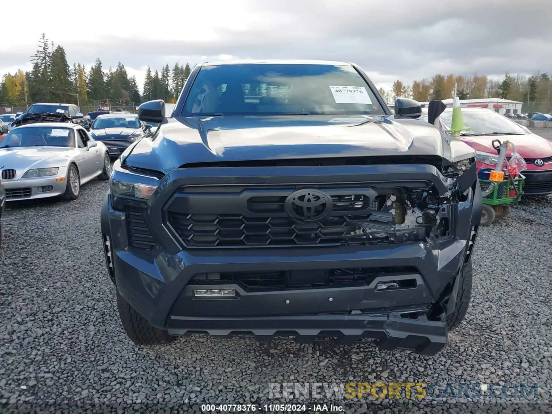 12 Photograph of a damaged car 3TMLB5JN4RM009499 TOYOTA TACOMA 2024