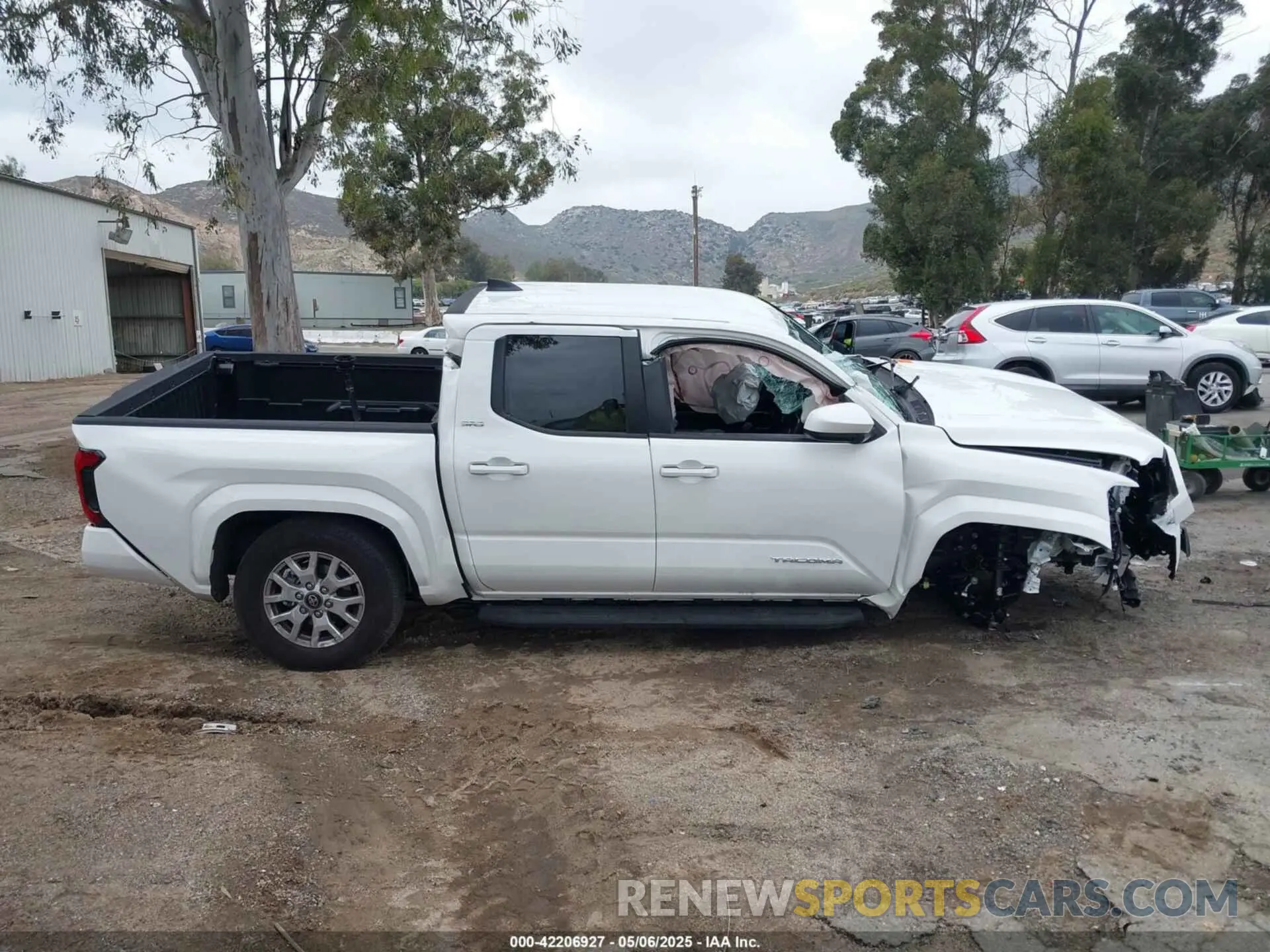 13 Photograph of a damaged car 3TMLB5JN5RM081702 TOYOTA TACOMA 2024