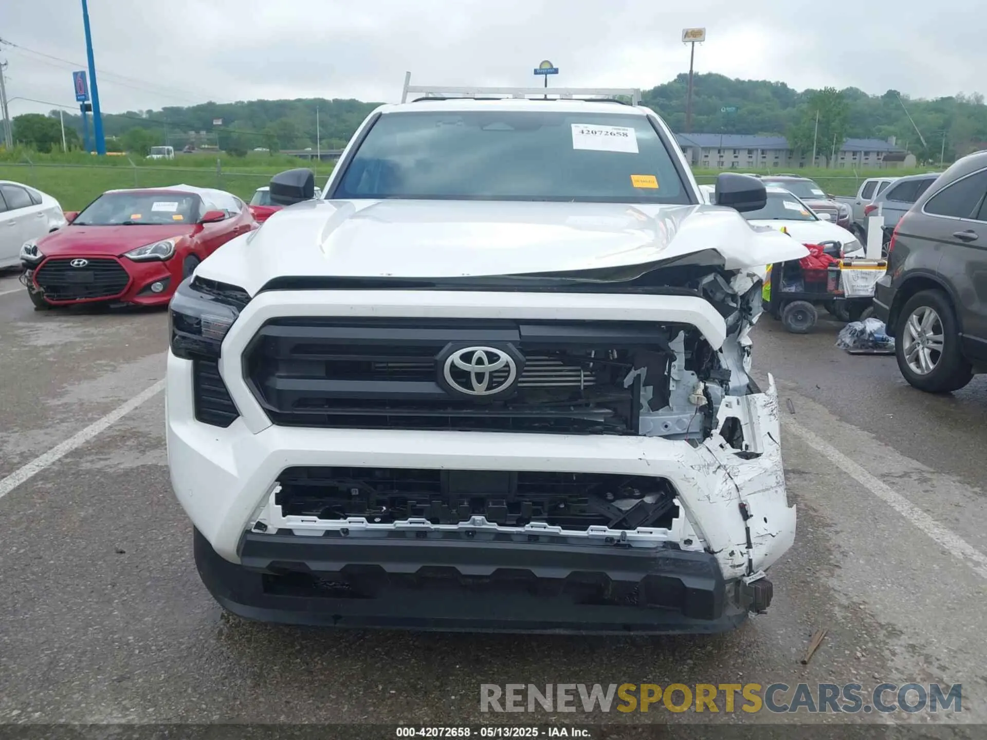 12 Photograph of a damaged car 3TYJDAHN9RT014721 TOYOTA TACOMA 2024