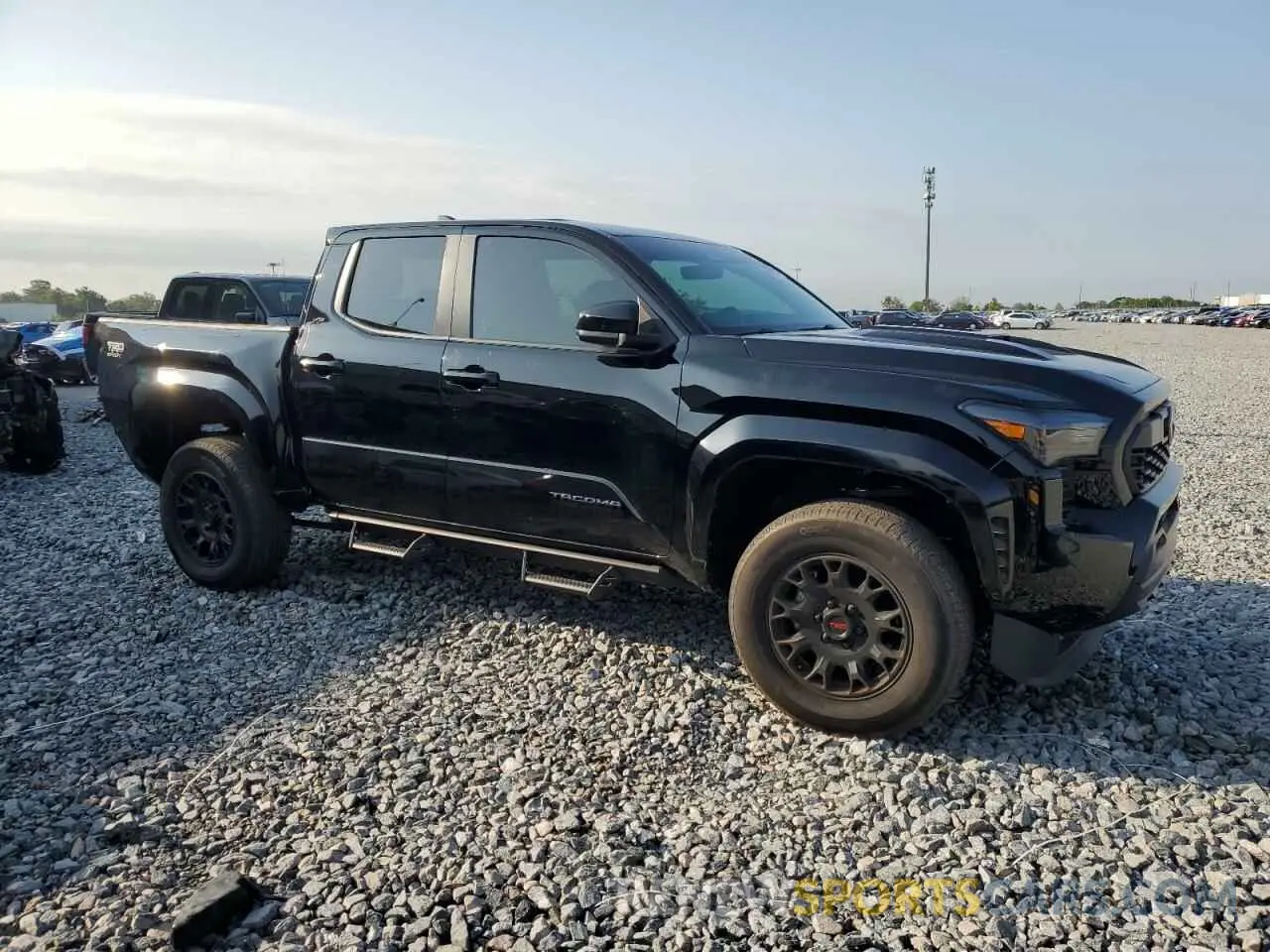 4 Photograph of a damaged car 3TYKB5FN9RT000743 TOYOTA TACOMA 2024