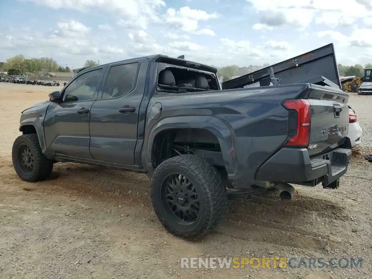 2 Photograph of a damaged car 3TYKE5JN5RT004061 TOYOTA TACOMA 2024