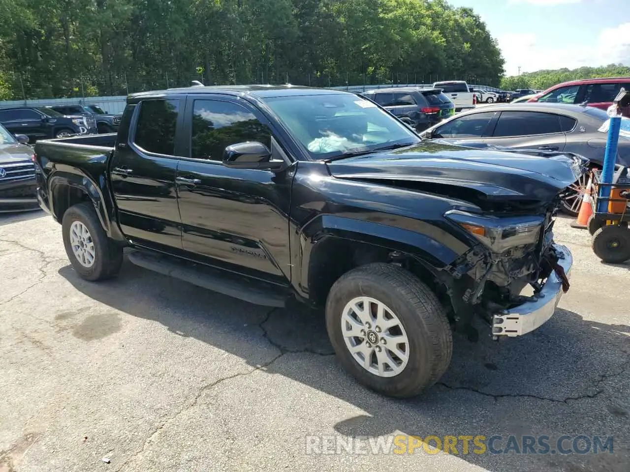 4 Photograph of a damaged car 3TYLB5JN0RT030340 TOYOTA TACOMA 2024