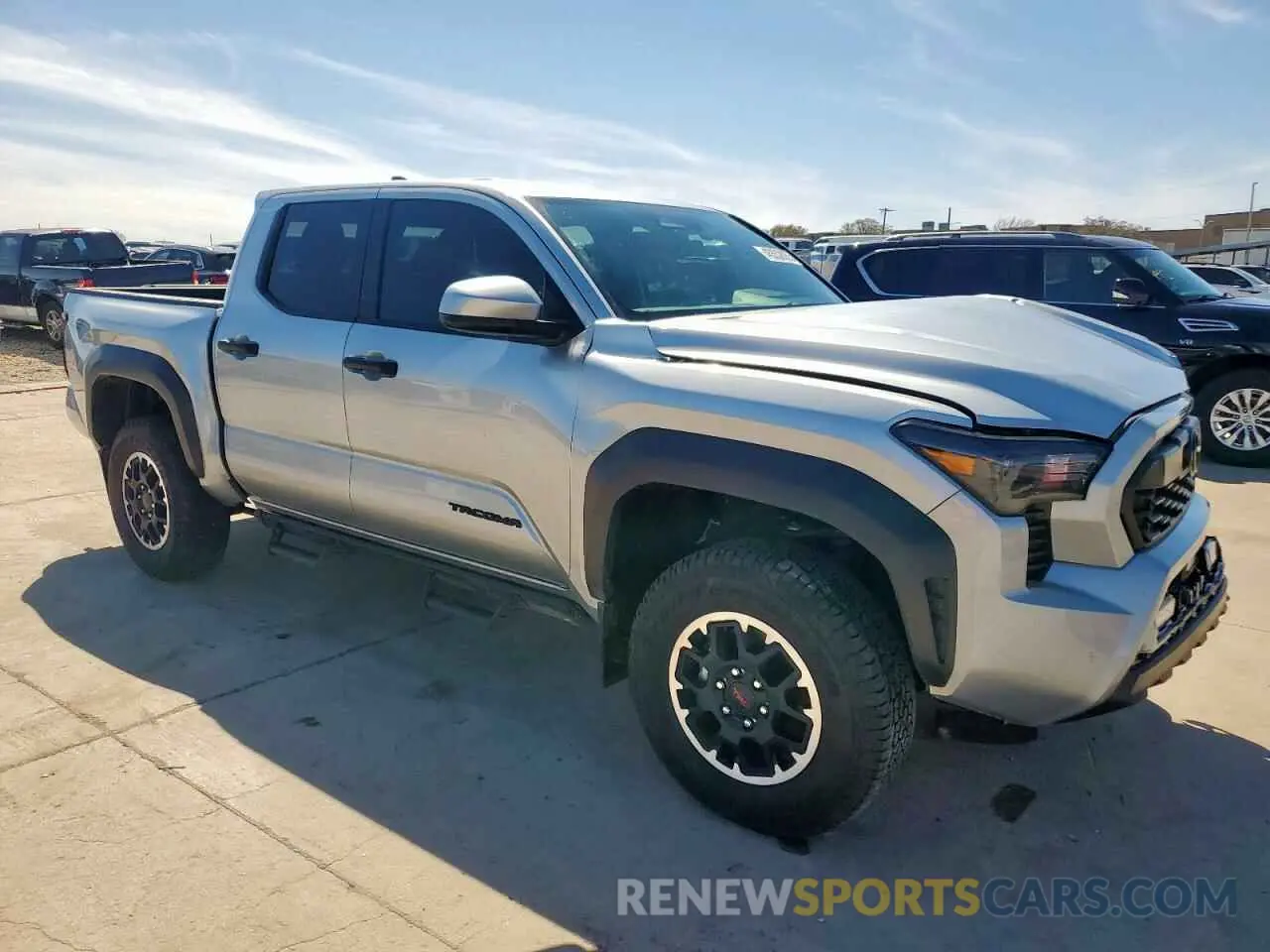 4 Photograph of a damaged car 3TYLB5JN0RT041273 TOYOTA TACOMA 2024