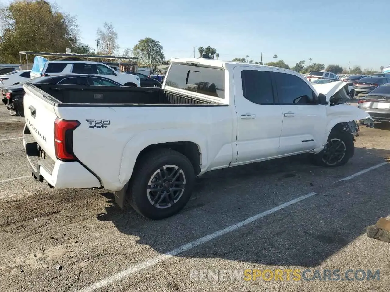 3 Photograph of a damaged car 3TYLB5JN1RT000294 TOYOTA TACOMA 2024