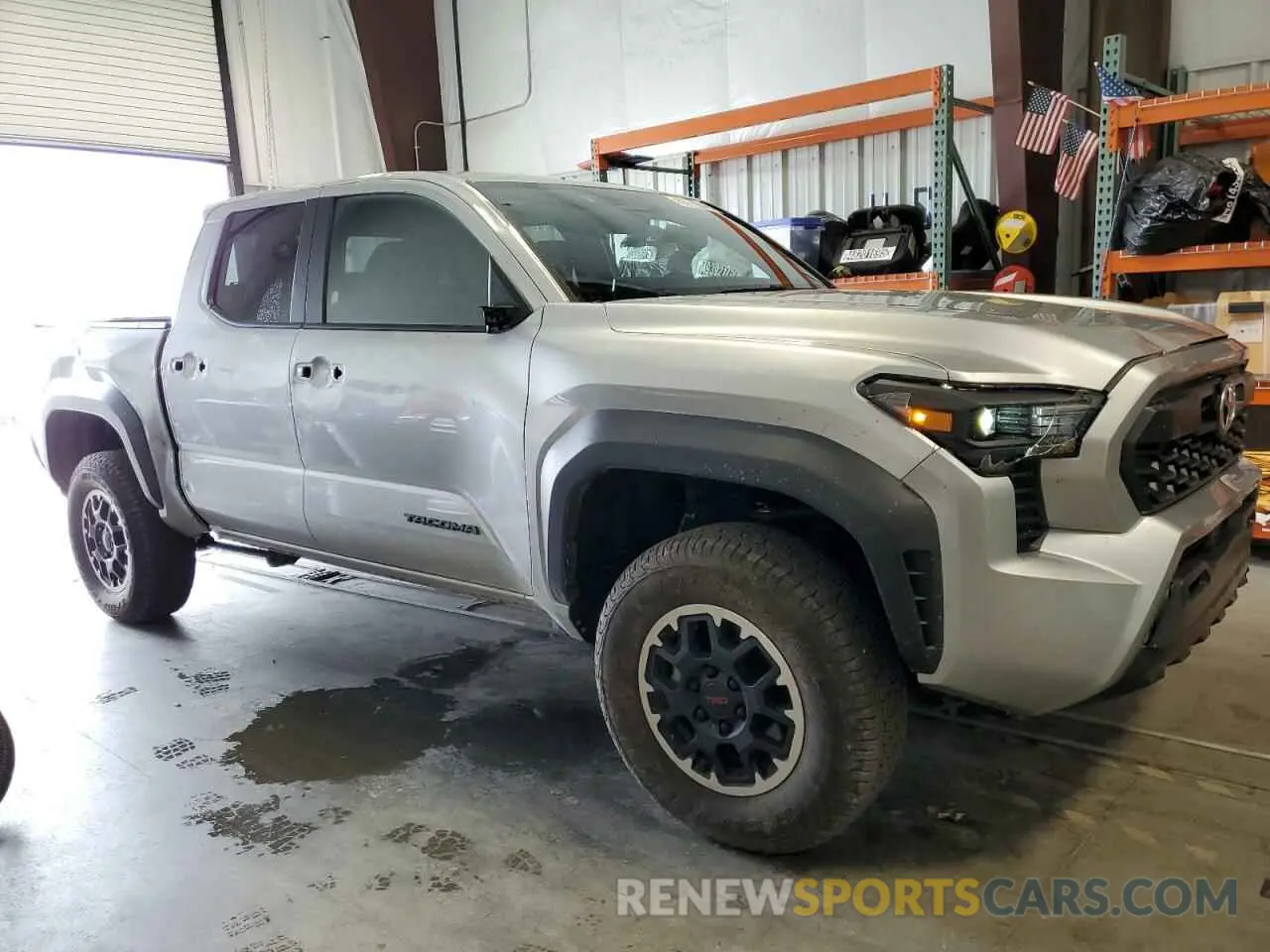 4 Photograph of a damaged car 3TYLB5JN5RT002114 TOYOTA TACOMA 2024