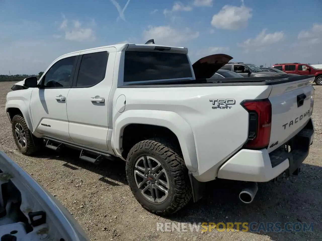 2 Photograph of a damaged car 3TYLB5JN7RT053761 TOYOTA TACOMA 2024
