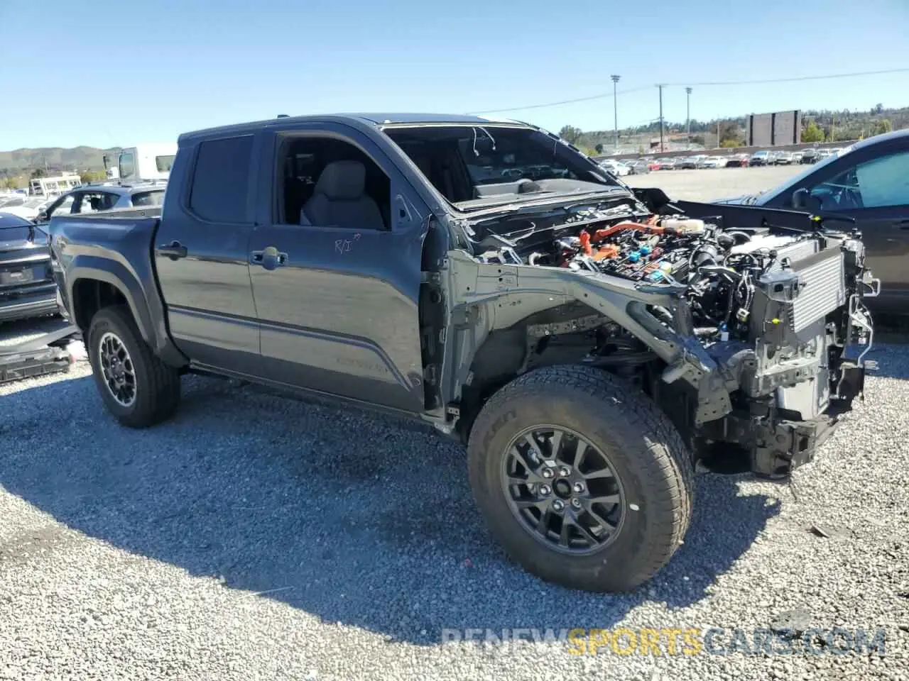 4 Photograph of a damaged car 3TYLC5LN7RT012069 TOYOTA TACOMA 2024