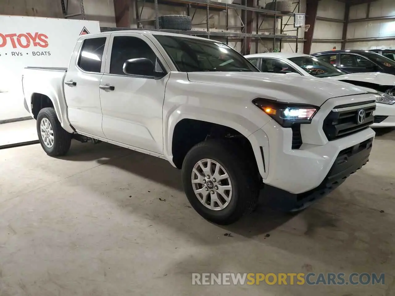 4 Photograph of a damaged car 3TYLD5KN2RT004573 TOYOTA TACOMA 2024