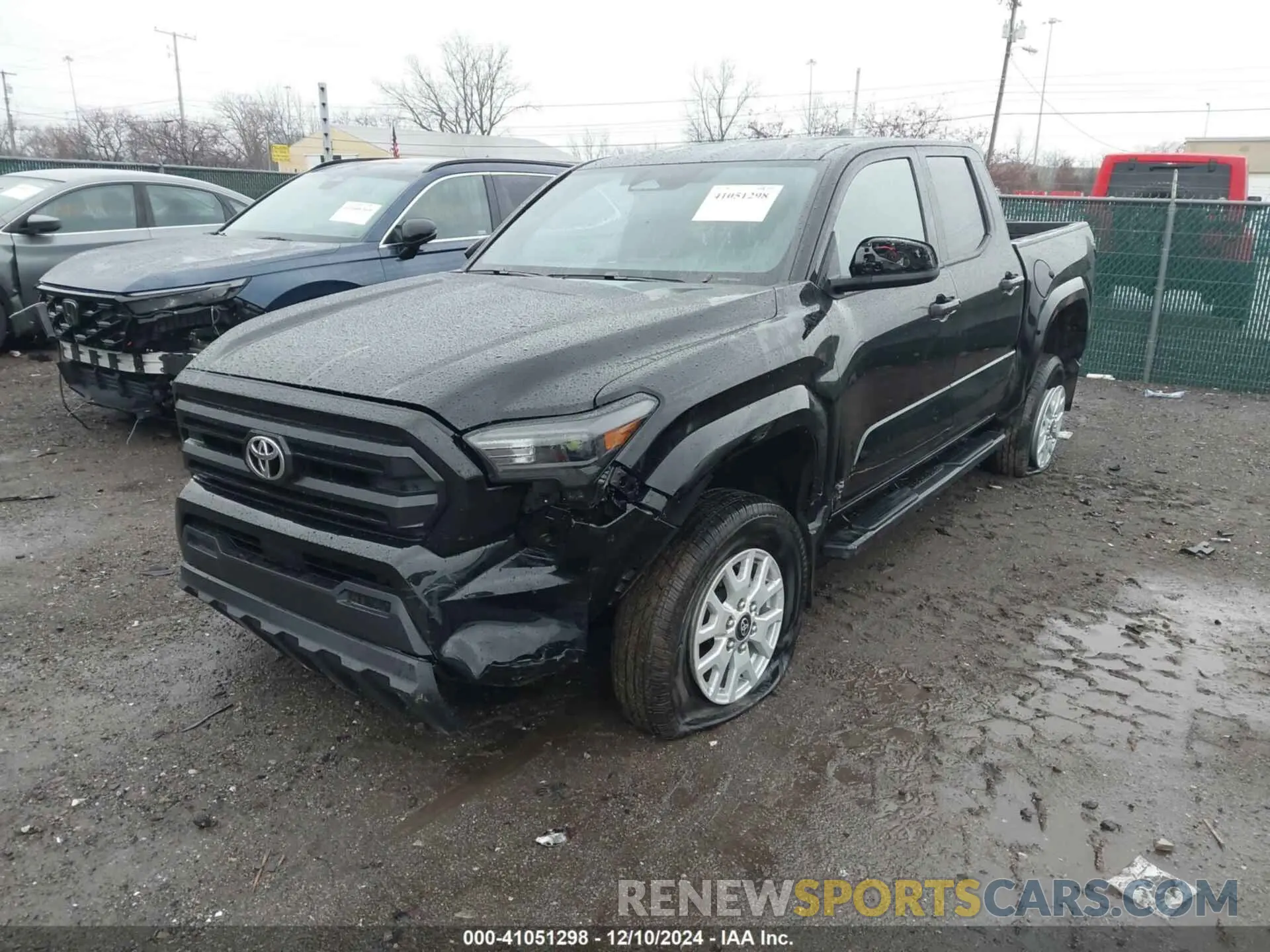 2 Photograph of a damaged car 3TYLD5KN2RT004962 TOYOTA TACOMA 2024