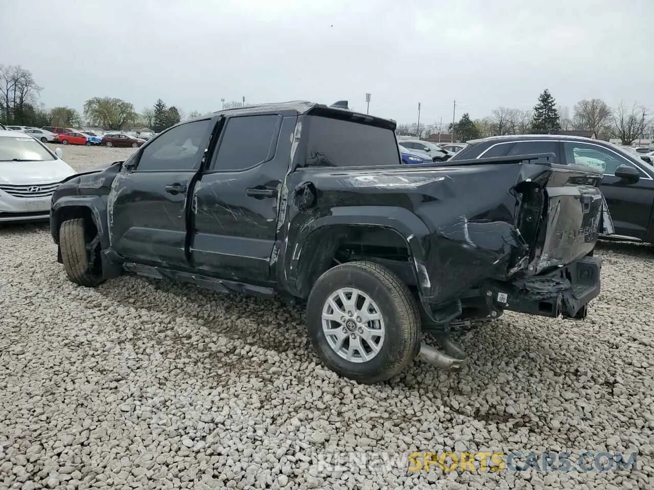 2 Photograph of a damaged car 3TYLD5KN8RT005999 TOYOTA TACOMA 2024
