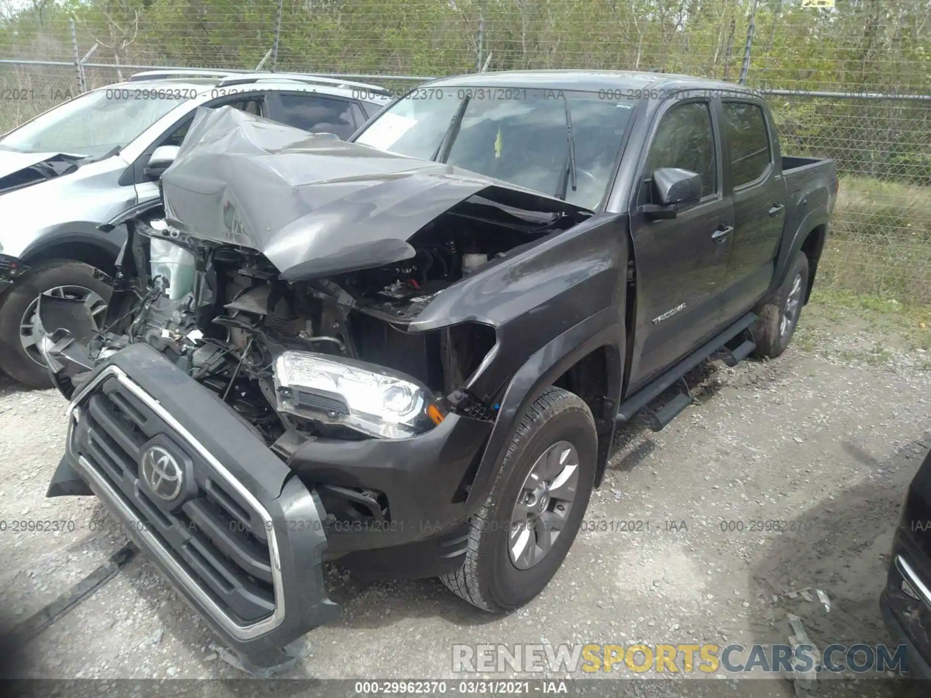 2 Photograph of a damaged car 3TMAZ5CN0KM095870 TOYOTA TACOMA 2WD 2019