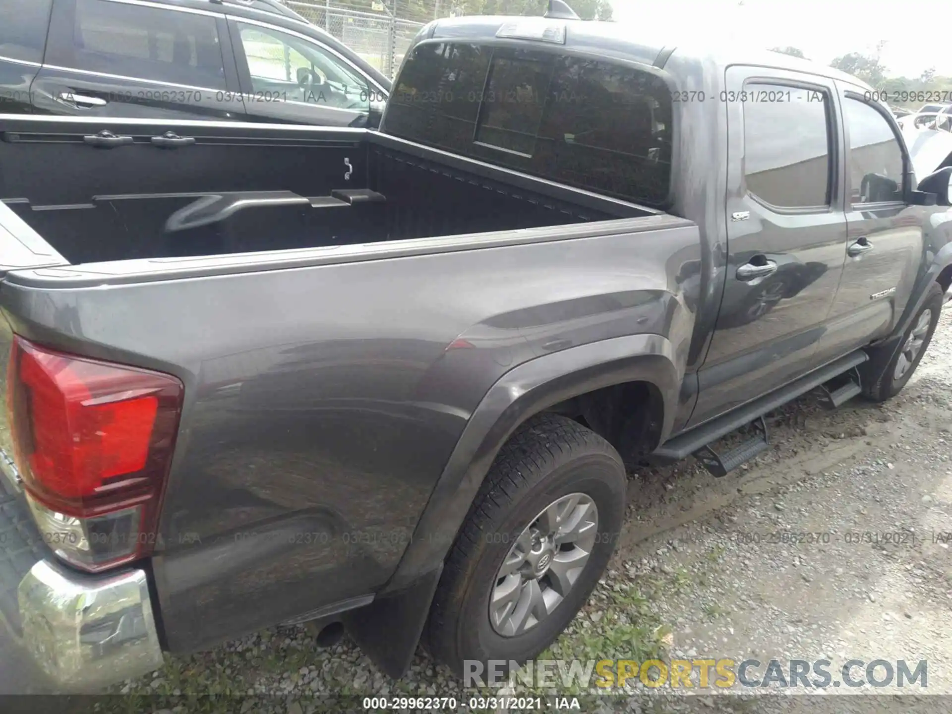 4 Photograph of a damaged car 3TMAZ5CN0KM095870 TOYOTA TACOMA 2WD 2019