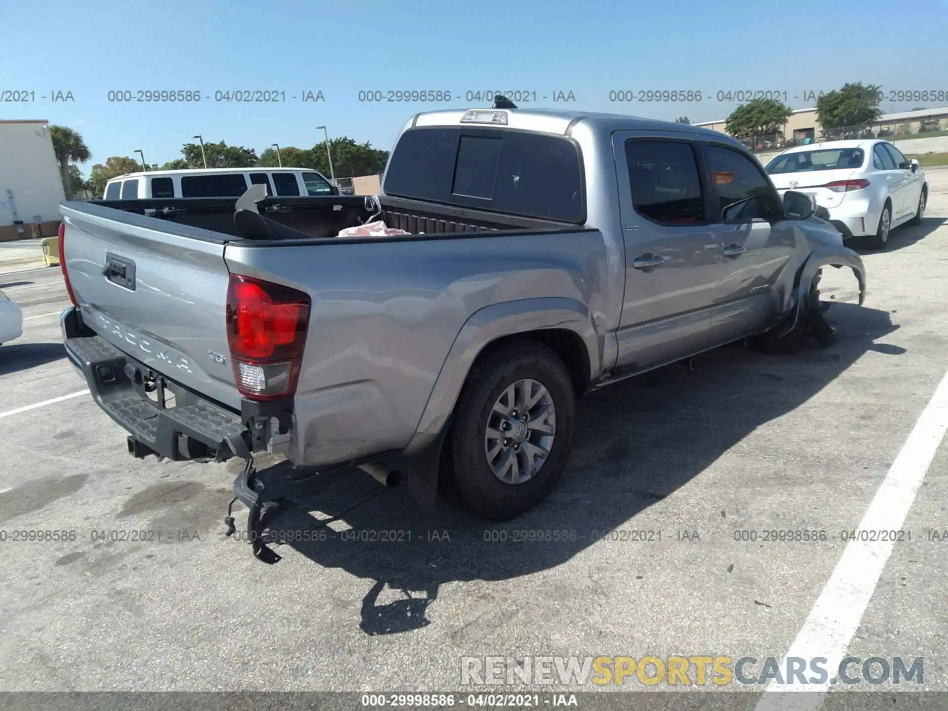 4 Photograph of a damaged car 3TMAZ5CN3KM103735 TOYOTA TACOMA 2WD 2019