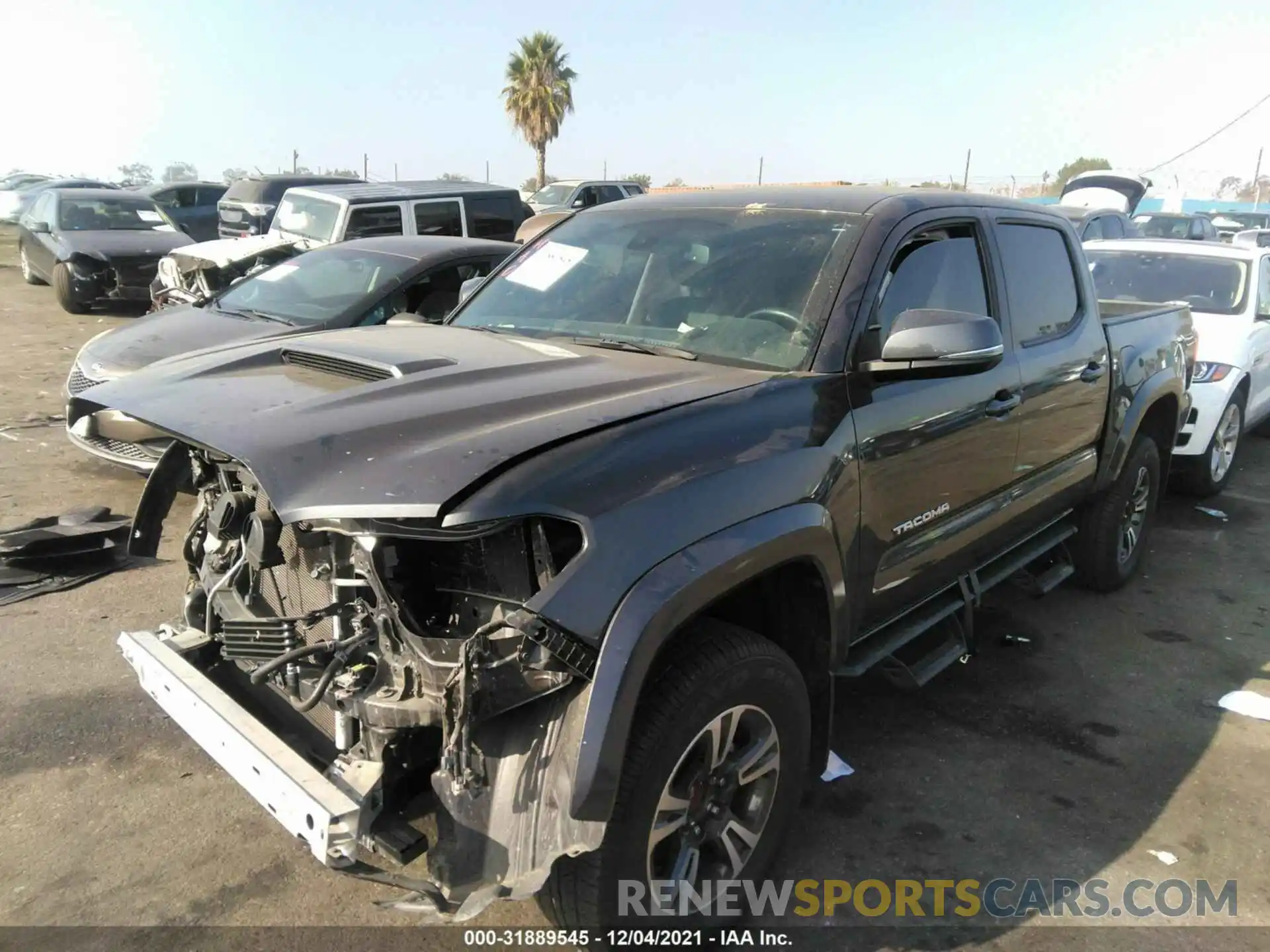 2 Photograph of a damaged car 3TMAZ5CN7KM090813 TOYOTA TACOMA 2WD 2019