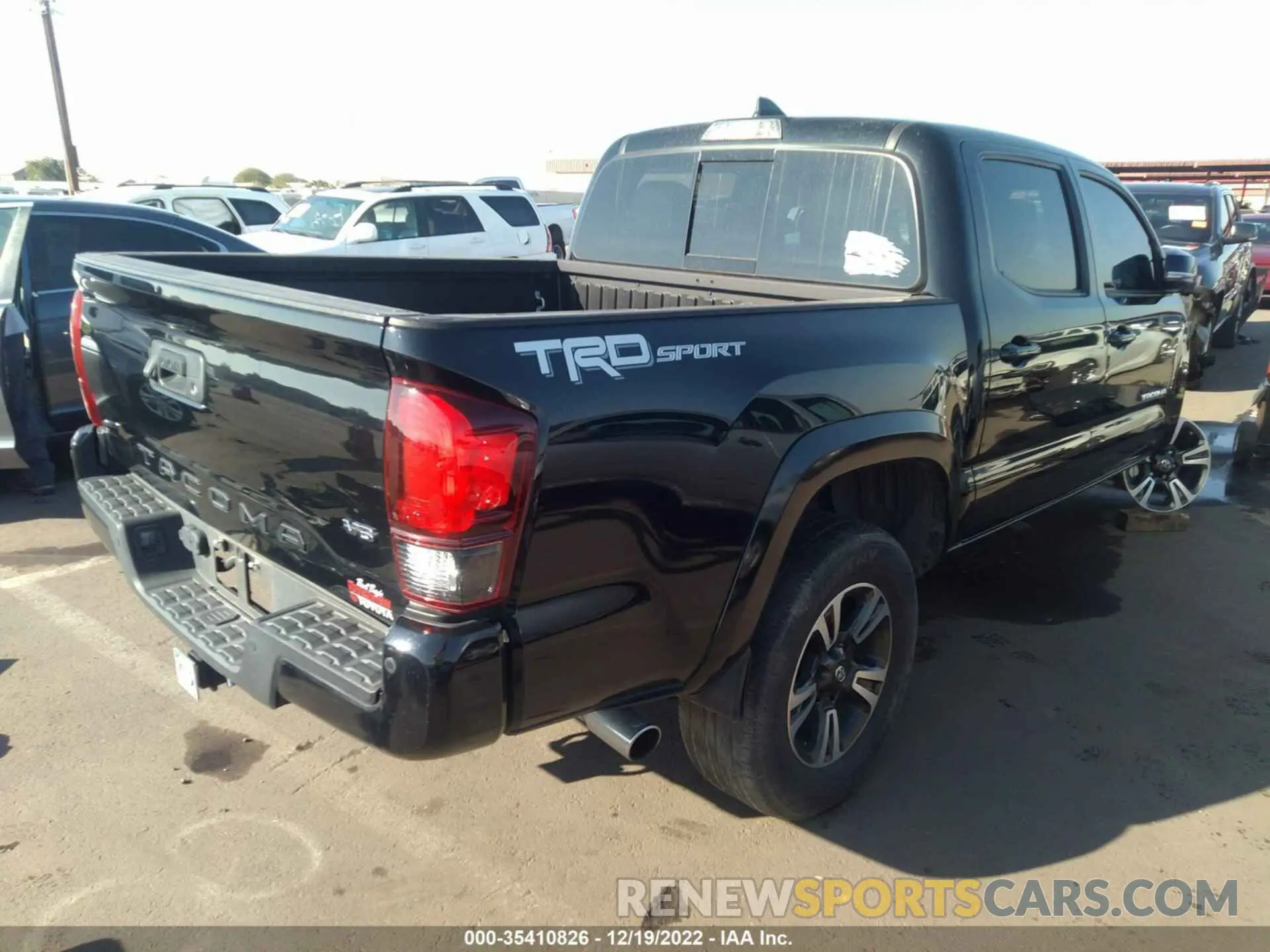 4 Photograph of a damaged car 3TMAZ5CNXKM085914 TOYOTA TACOMA 2WD 2019