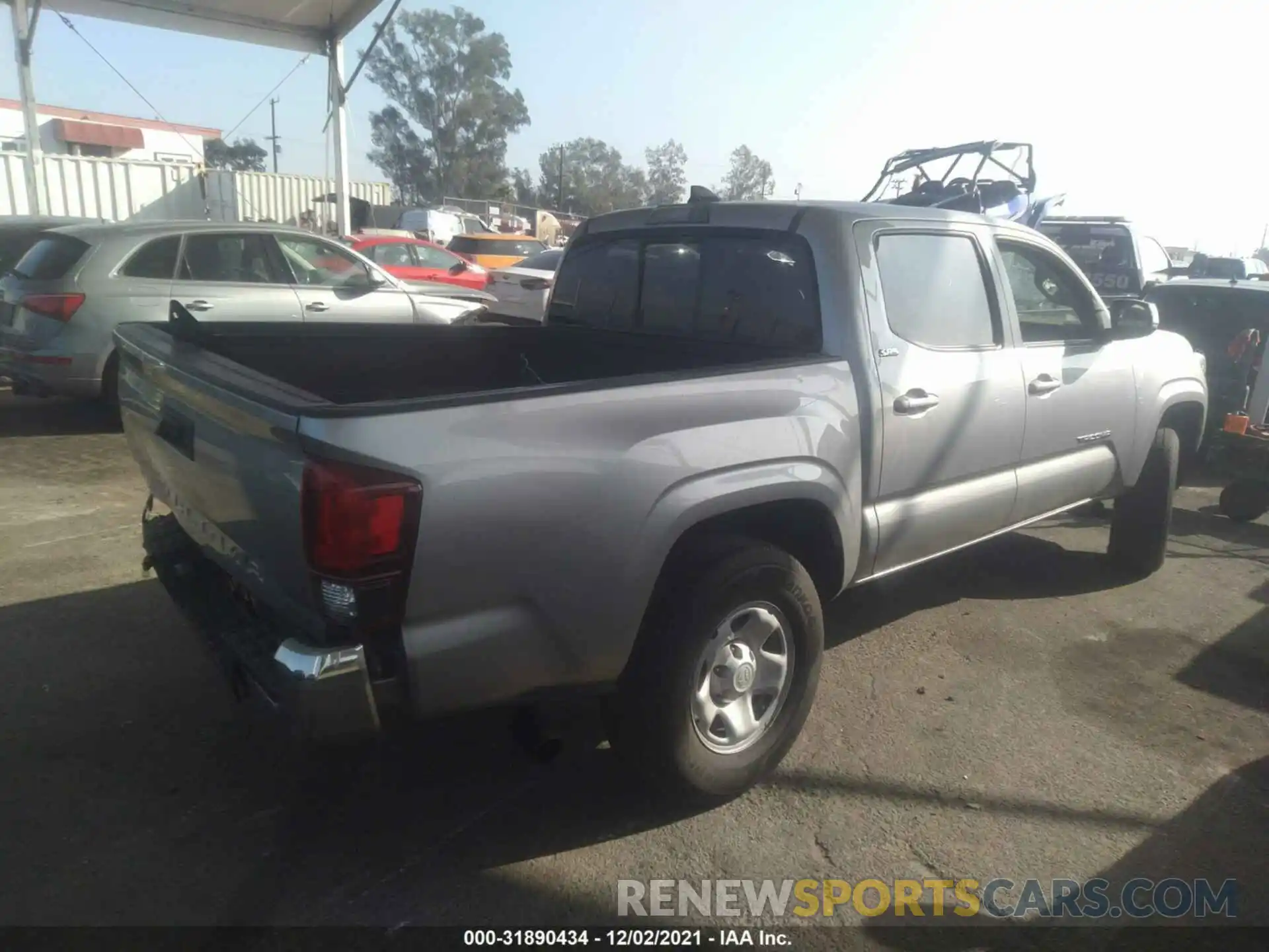 4 Photograph of a damaged car 5TFAX5GN0KX132393 TOYOTA TACOMA 2WD 2019