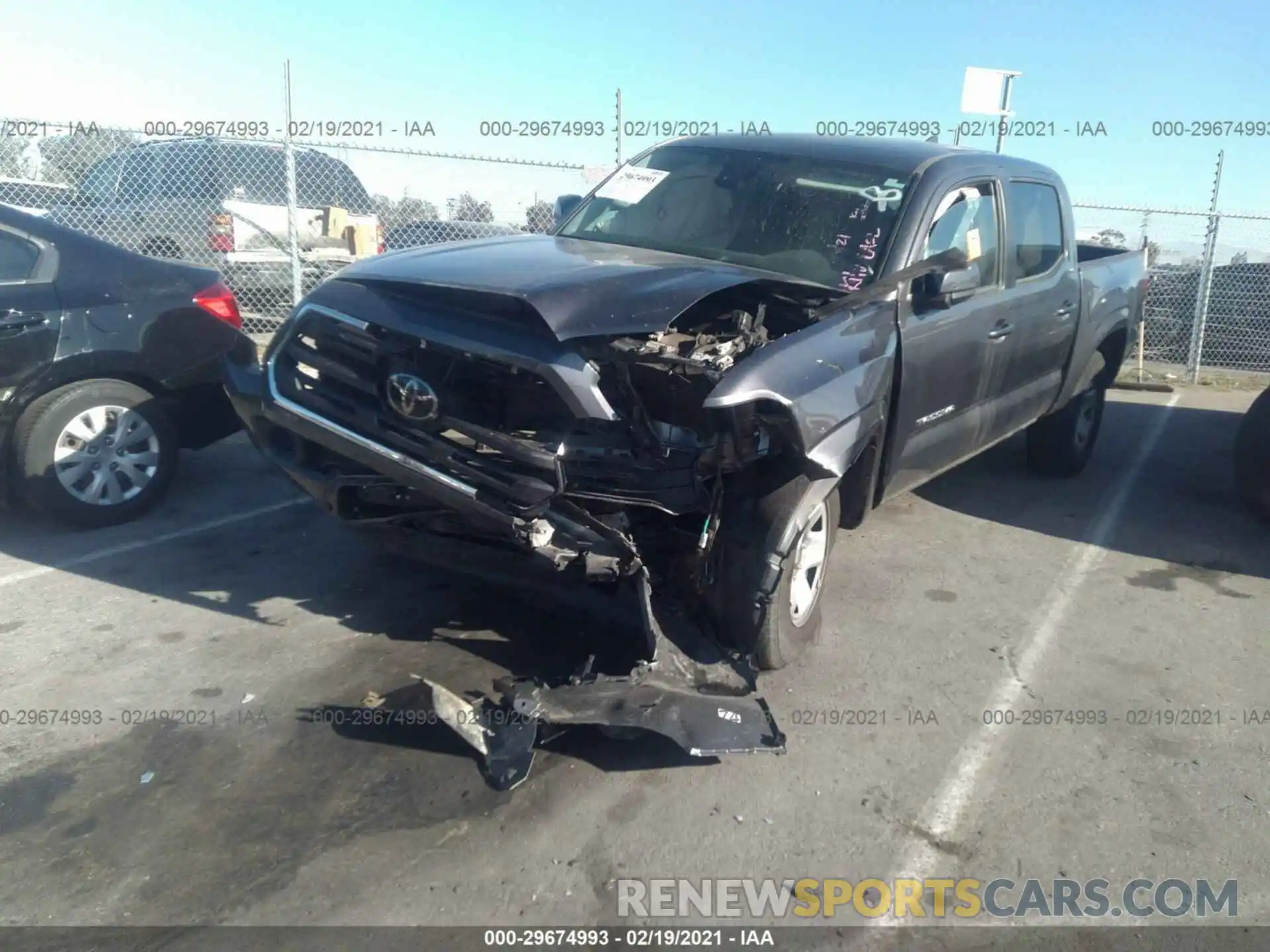 2 Photograph of a damaged car 5TFAX5GN1KX162020 TOYOTA TACOMA 2WD 2019