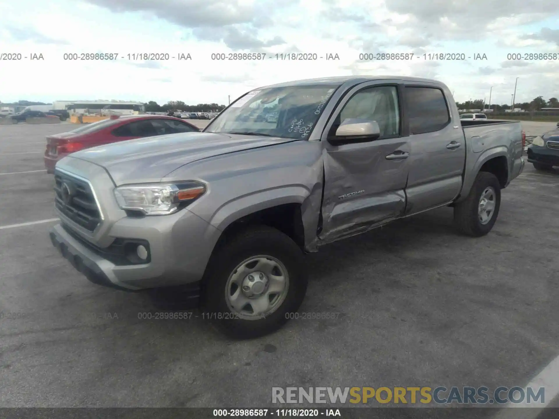 2 Photograph of a damaged car 5TFAX5GN3KX139936 TOYOTA TACOMA 2WD 2019