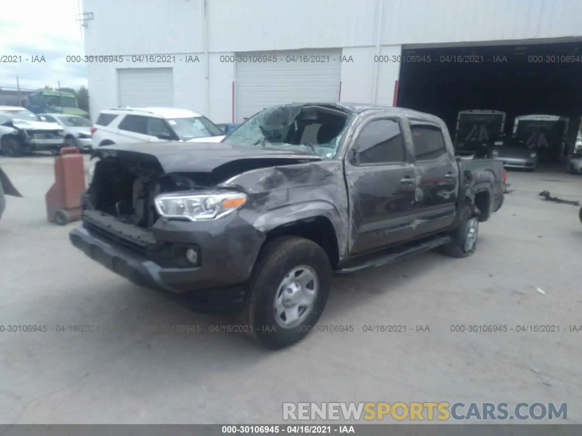 2 Photograph of a damaged car 5TFAX5GN5KX149223 TOYOTA TACOMA 2WD 2019