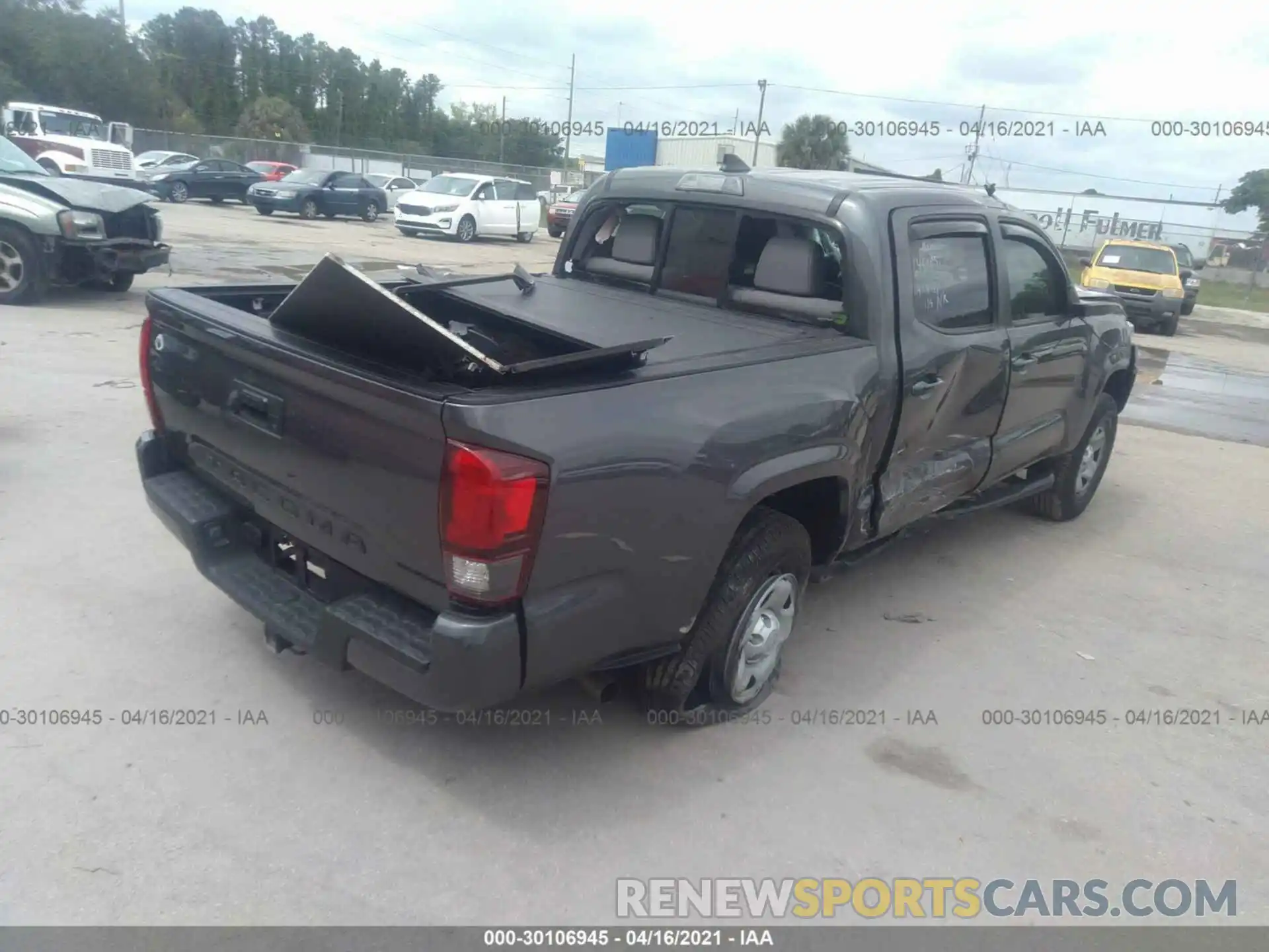 4 Photograph of a damaged car 5TFAX5GN5KX149223 TOYOTA TACOMA 2WD 2019