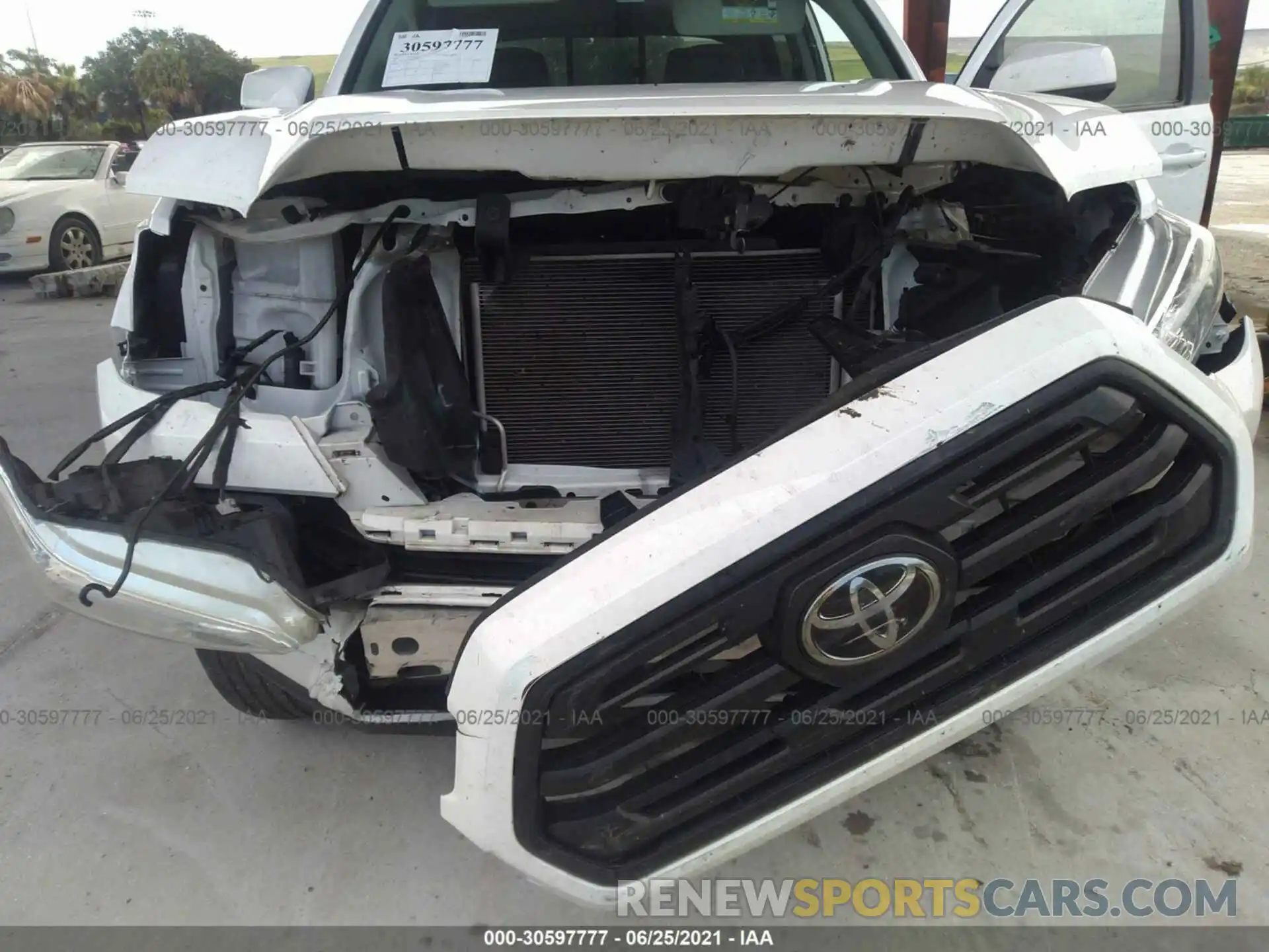 6 Photograph of a damaged car 5TFAX5GN7KX147411 TOYOTA TACOMA 2WD 2019